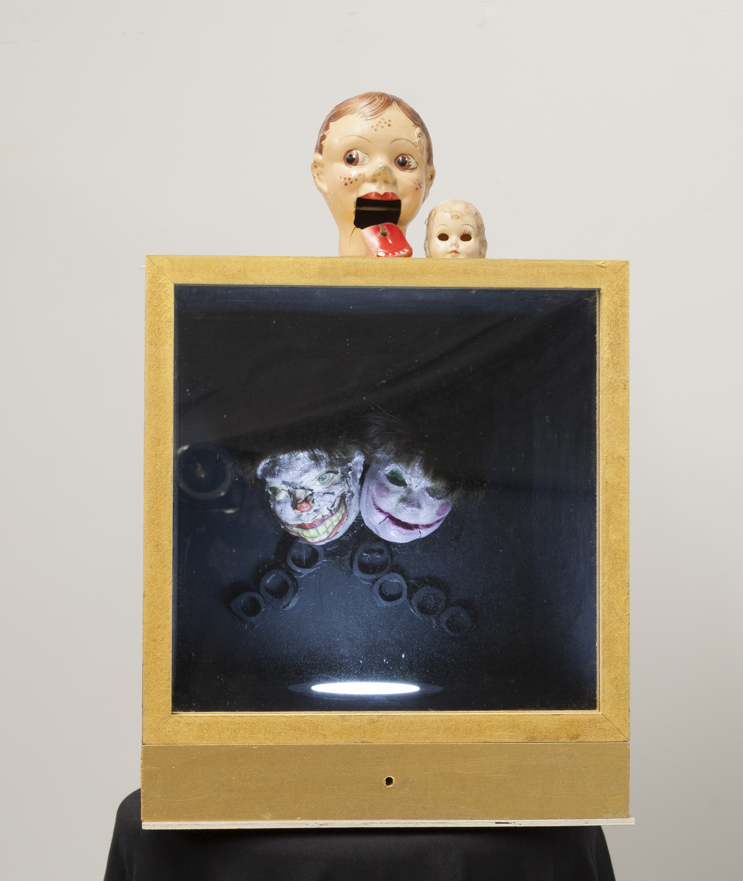 Two Heads Left in a Chivarobe