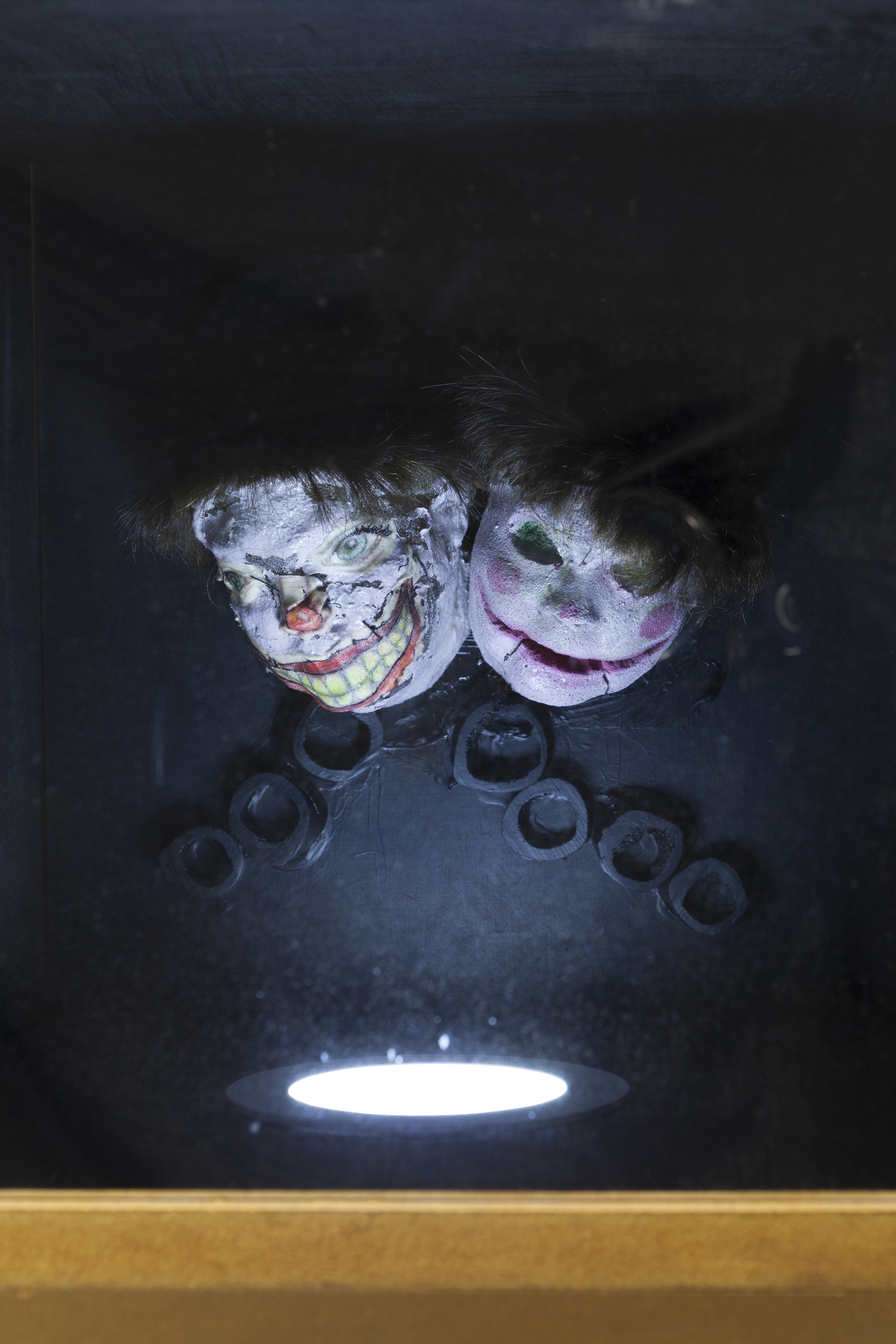 Two Heads Left in a Chivarobe