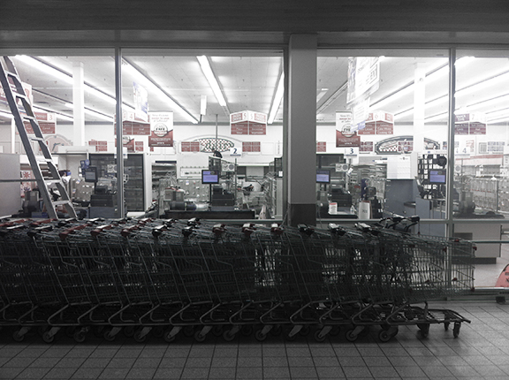 Empty shelves of a recently closed Safeway &nbsp;(©Deborah Clague)