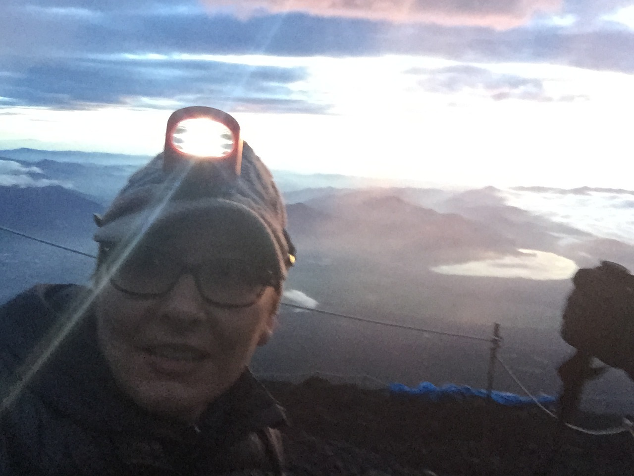 Me watching the sunrise over Japan from the summit of Mount Fuji. I CLIMBED A FREAKIN' MOUNTAIN (2015)!!!