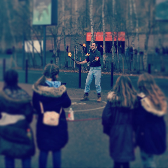 Street artist juggling fire, London (©Deborah Clague)