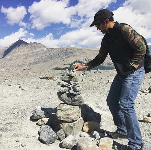 Adding a stone, making a wish.