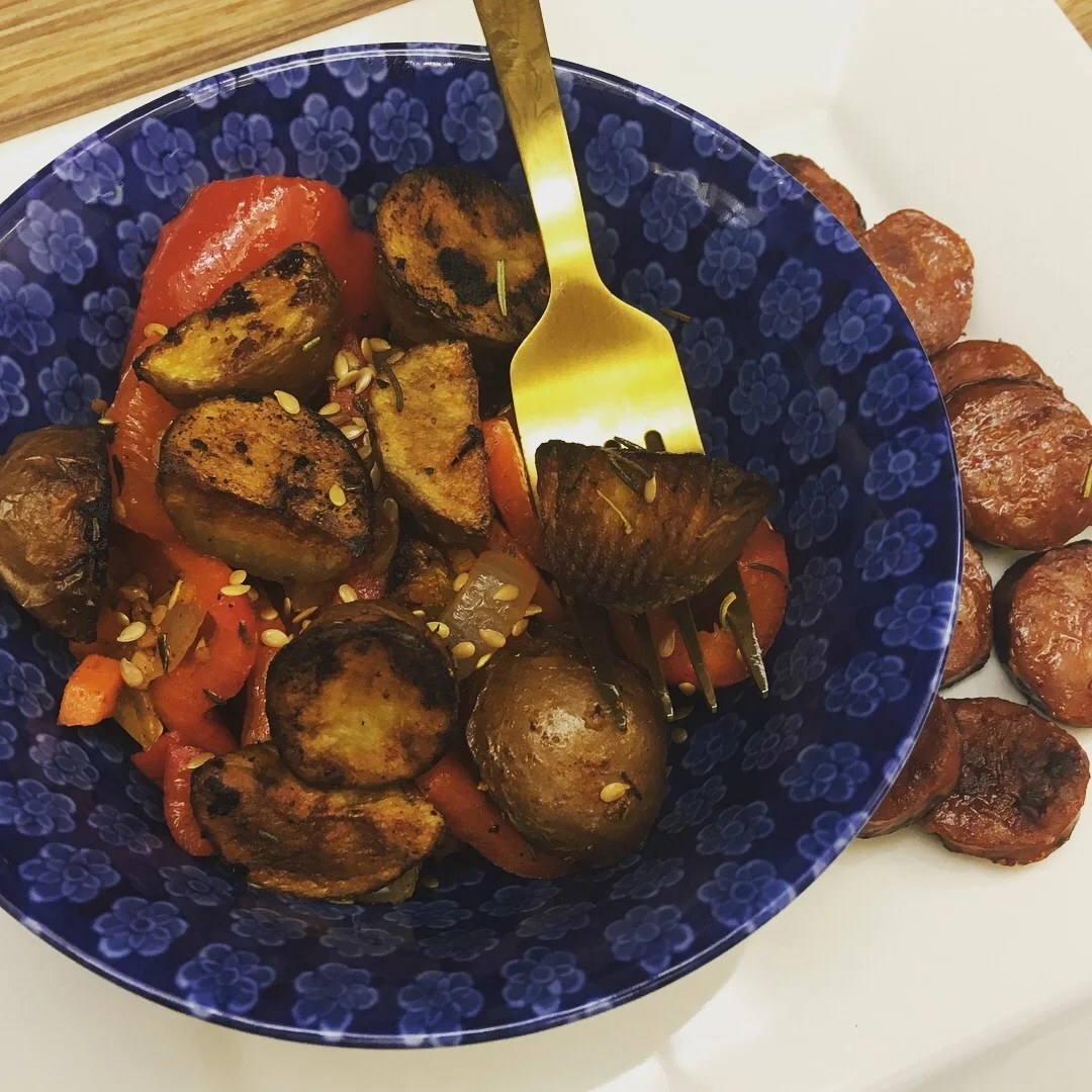 Patatas bravas is a traditional tapas style dish from Spain. It is made up of fried potatoes and a thick sauce made of onion, garlic, carrots, pepper and tomatoes. I served mine with a side of chorizo (©Deborah Clague). 