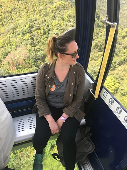 Going up the Ngong Ping 360 glass-bottom gondola on Lantau Island, China (©Deborah Clague, 2018). 