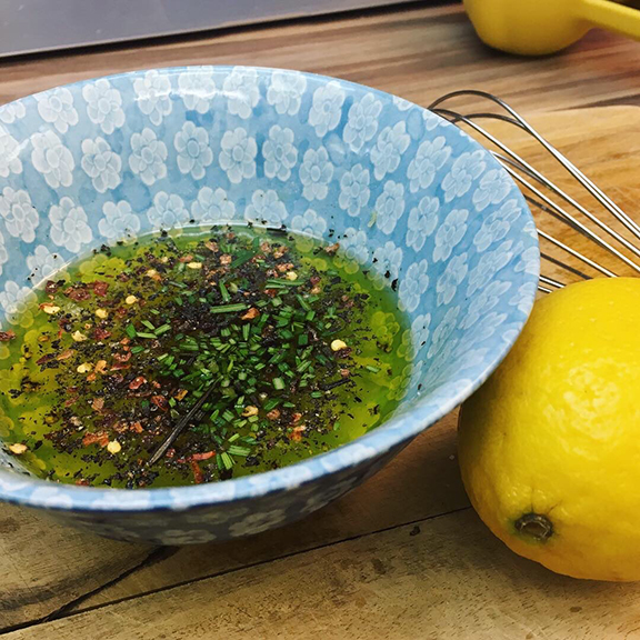 Preparing the marinade for lemon rosemary garlic chicken (©Deborah Clague, 2019).