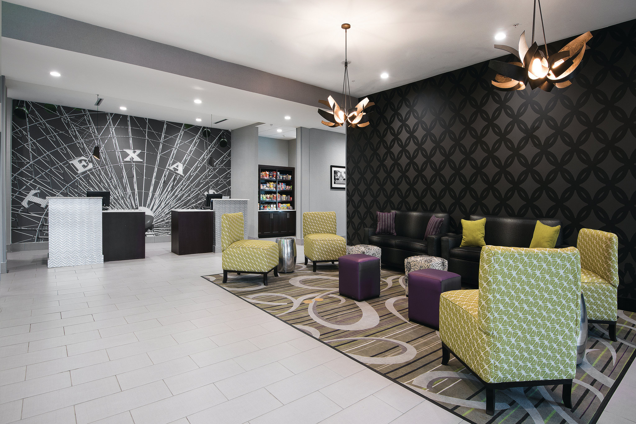 Above: La Quinta Inn and Suites in Fort Worth, Texas features a similar interior design to what will debut in Duluth (La Quinta)