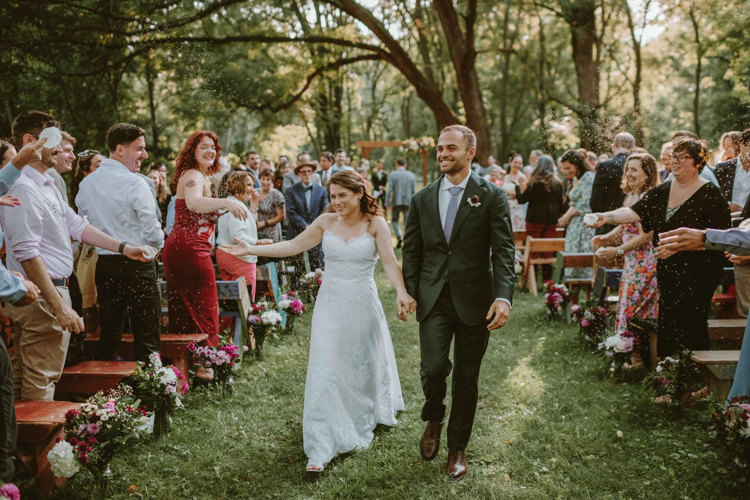 Bride and Groom outside ceremony during recessional