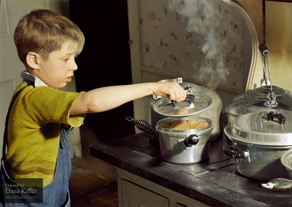 One of the Crouch children looking to see if the "pudd'n" is ready for their Thanksgiving dinner. Ledyard, Connecticut, 1940