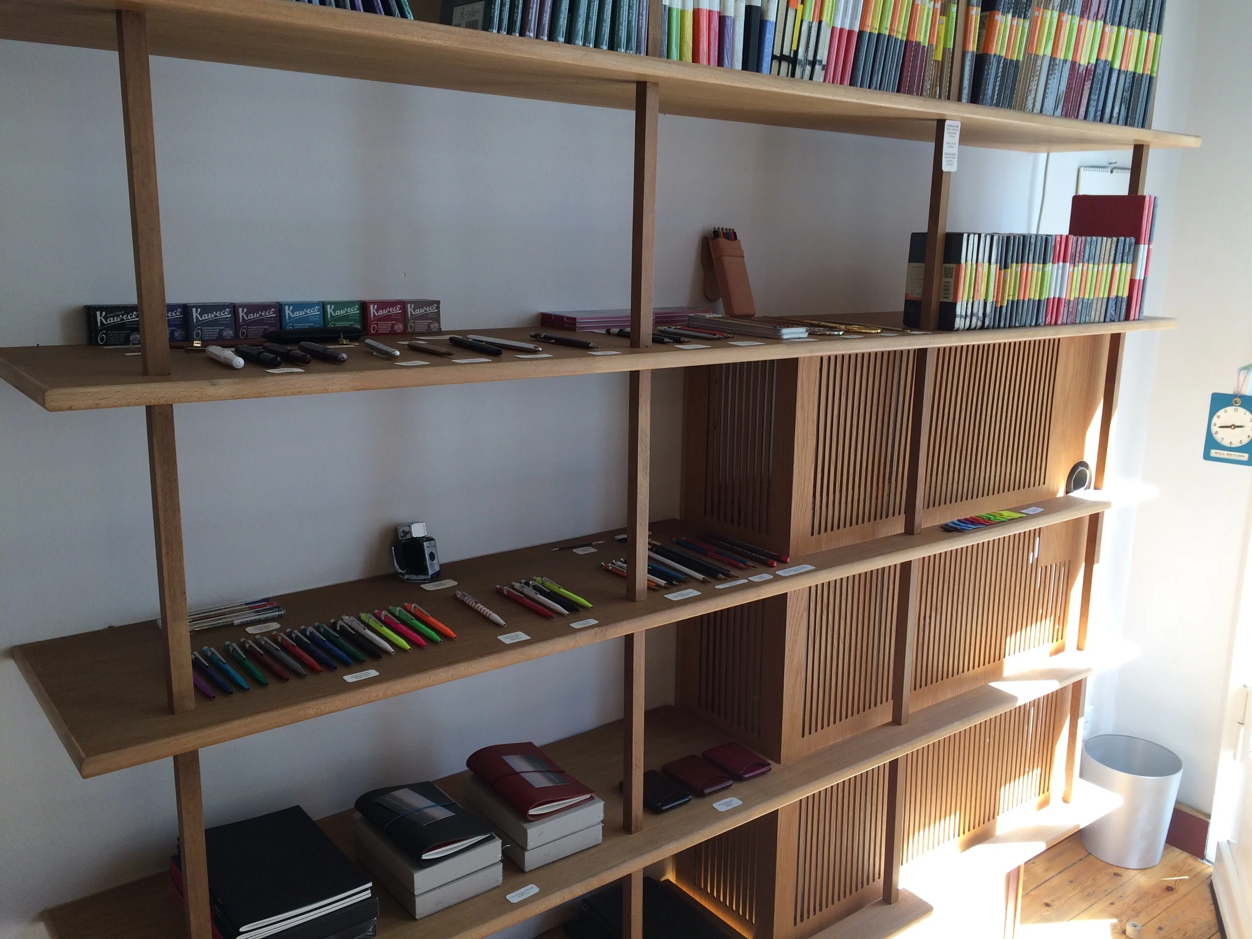 Minimalist shelving showing off all the cool stationery products