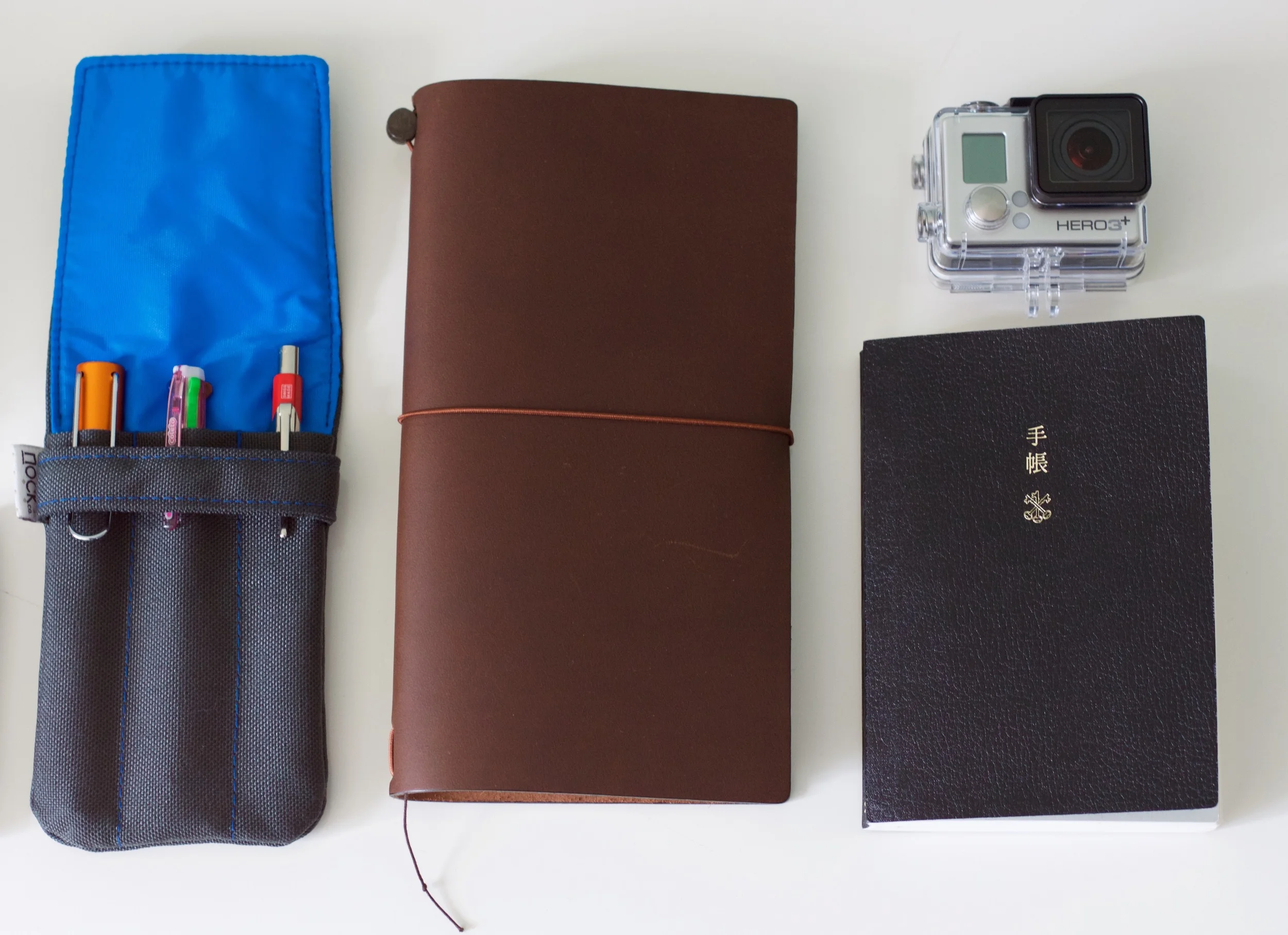 Nock Co Lookout with my essential travel pens, my MTN, Go Pro 3+ and my Hobonichi Techo