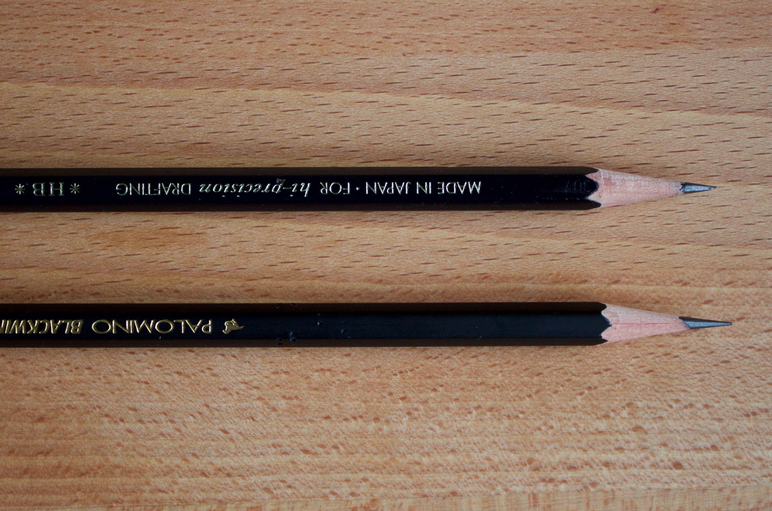 KUM long point on the top, Classroom Friendly Sharpener on the bottom