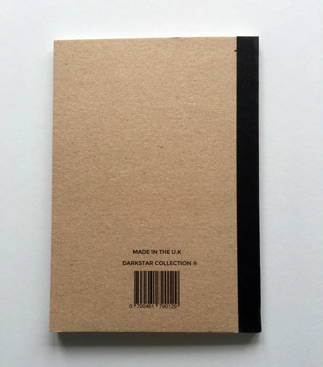 The reverse of the notebook. Unfortunately the branding and information on the back has not been aligned with the binding width taken into consideration.