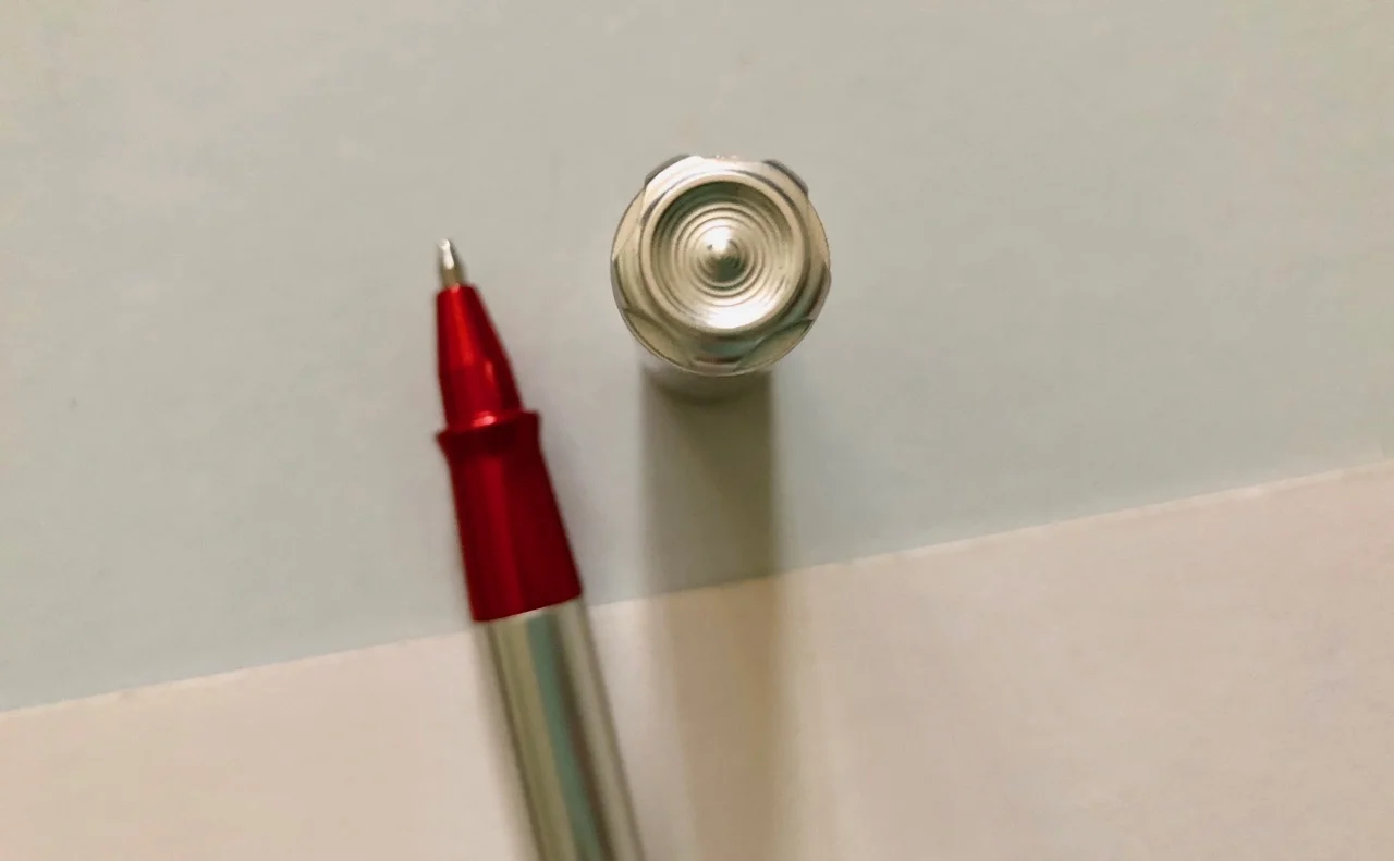The cog, or more rightly hose, design on the pen cap