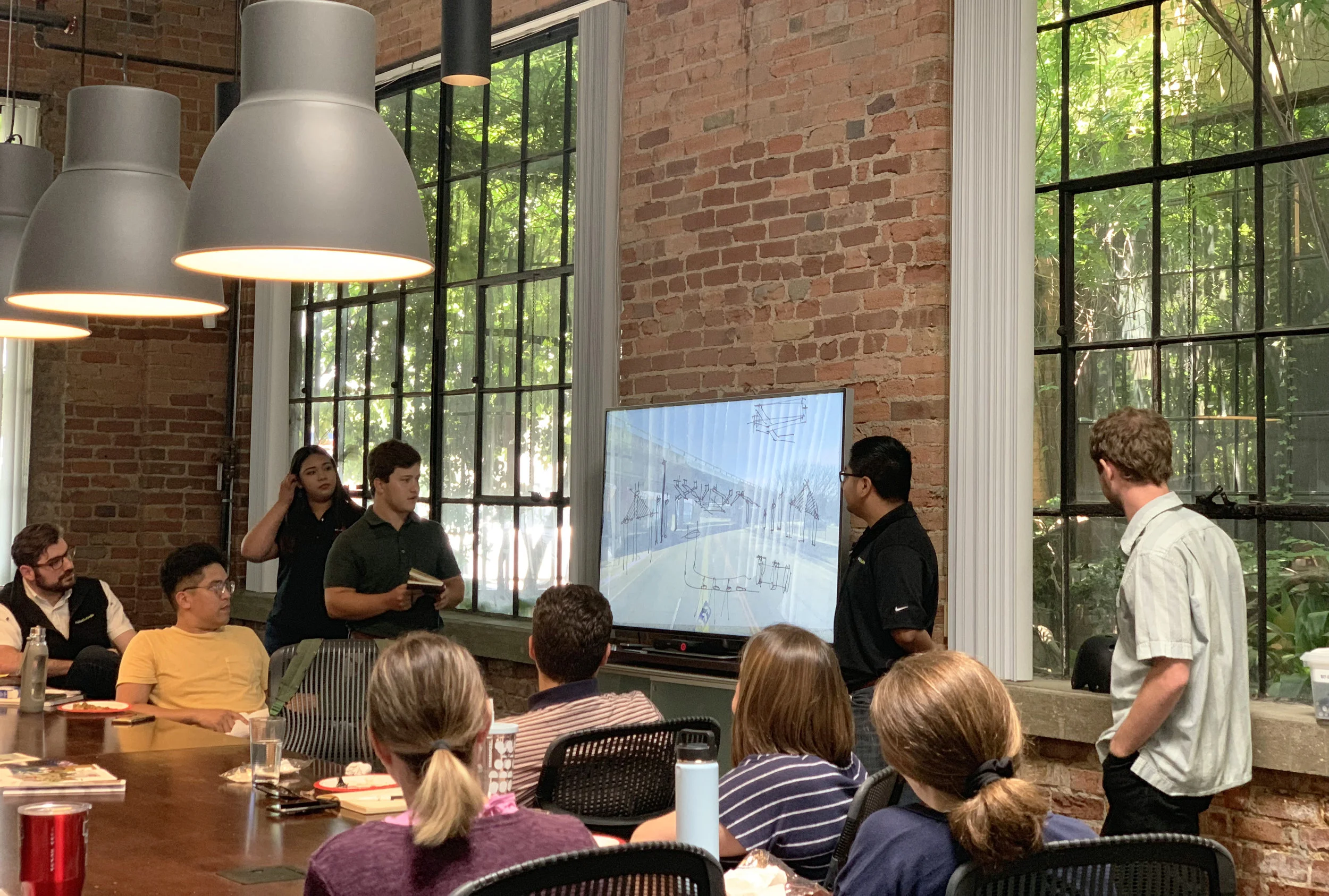 The interns give their final presentation.