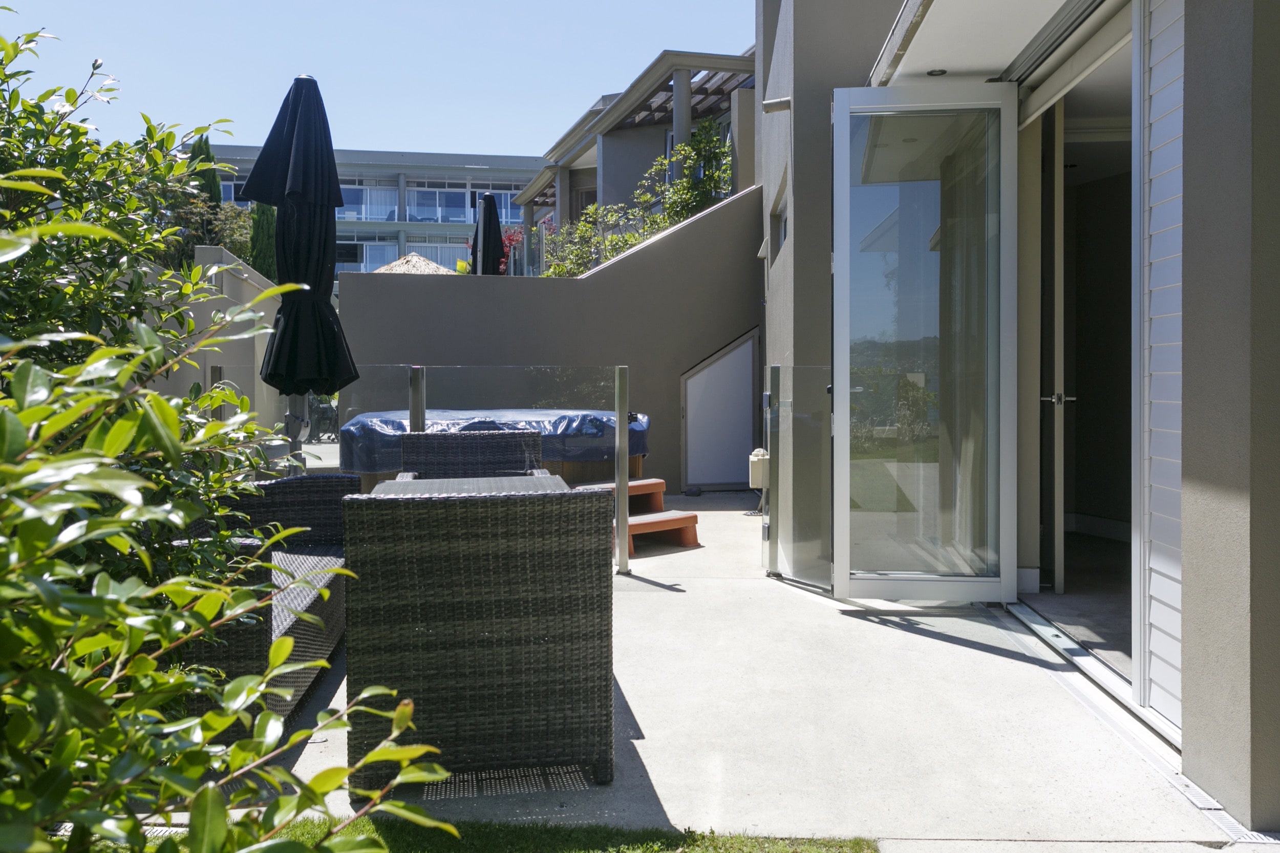 Ground floor two bedroom apartment outdoor furniture and private spa pool.jpg