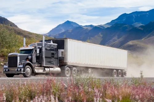 semi truck driving on road.jpg