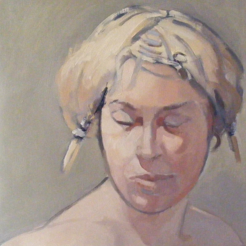 Model with plaited yellow hair
