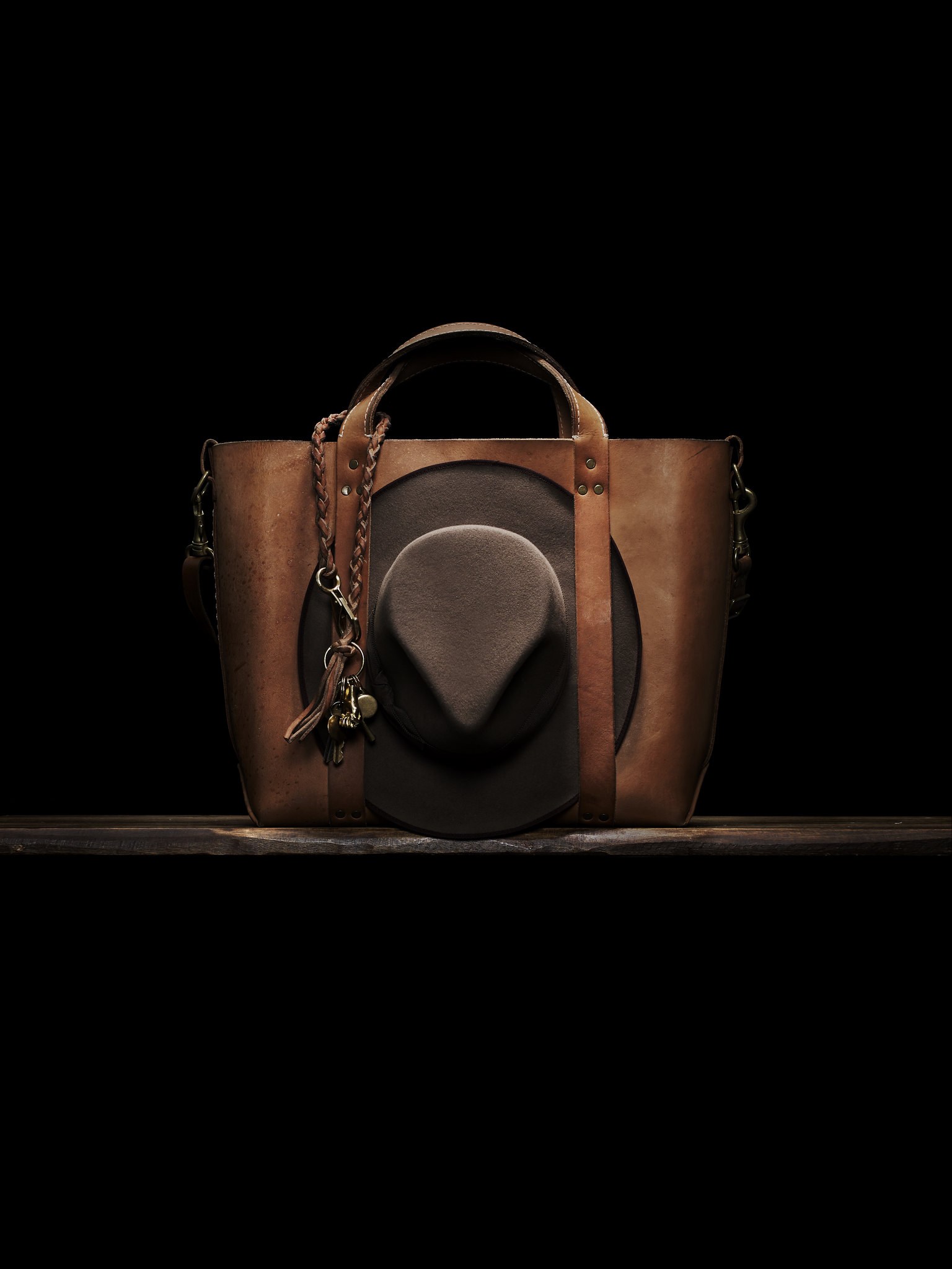 Poglia Signature Vegetable Tanned Leather Bags in Weather Aged finish.