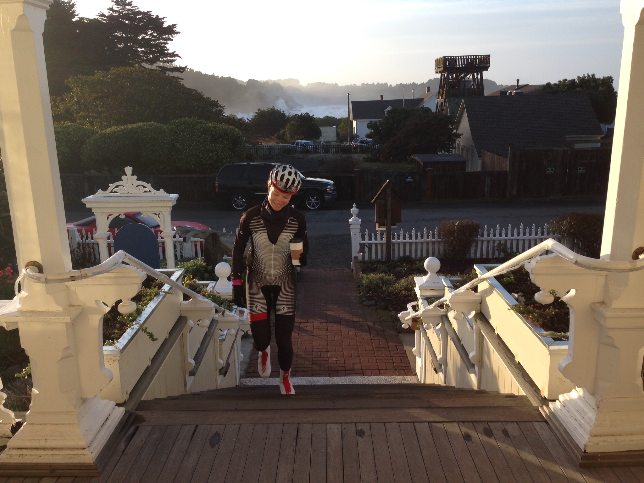 Walking up the steps to breakfast! Coffee in hand as always!