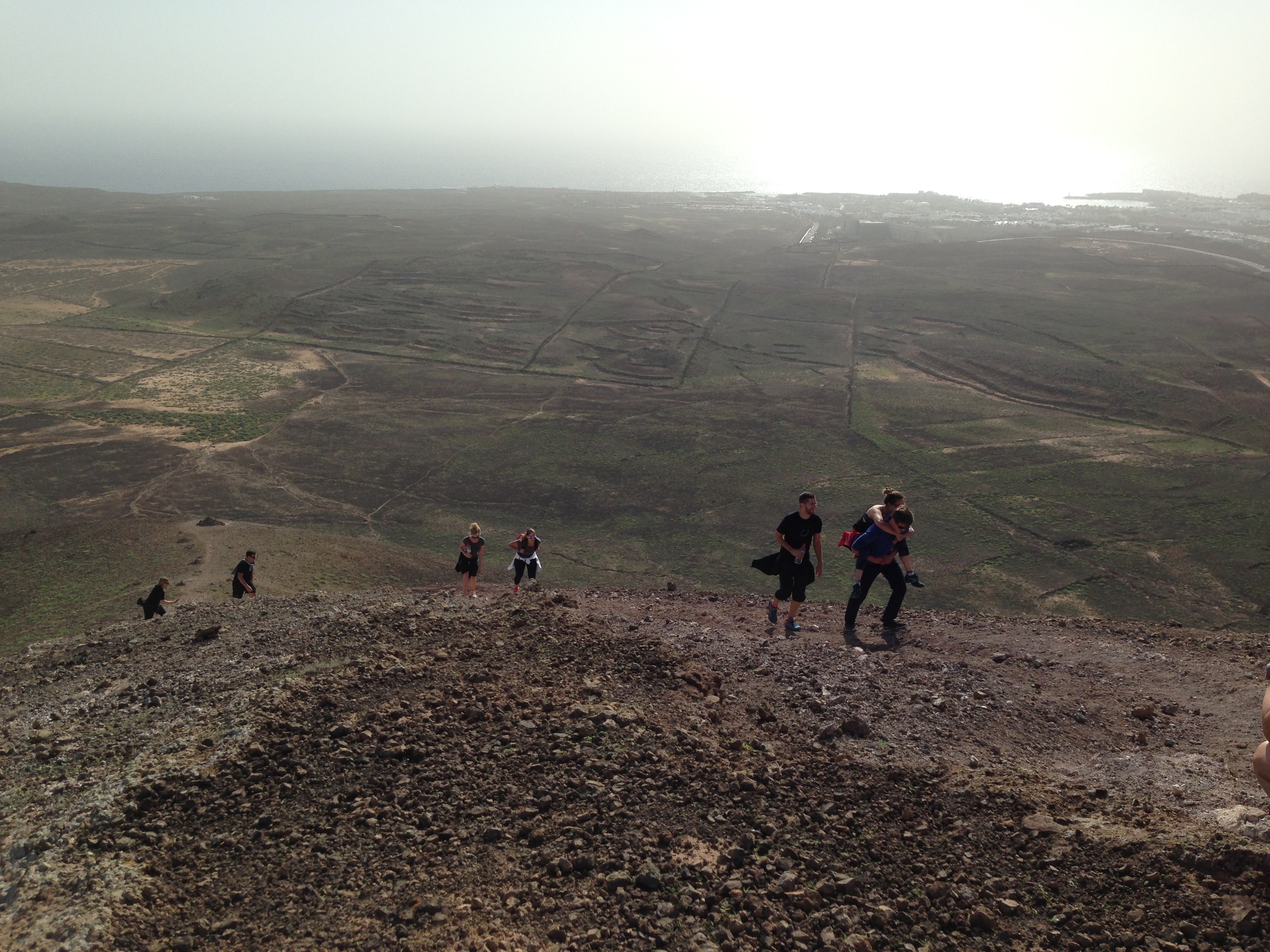 Look closely, that is our mechanic Sebastian carrying Karol-Ann up the mountain! Pretty impressive! :)