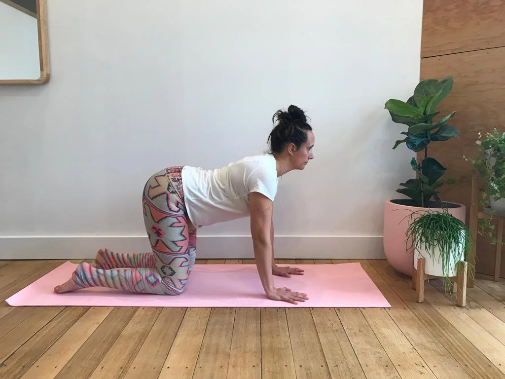 Cow pose with inhalation