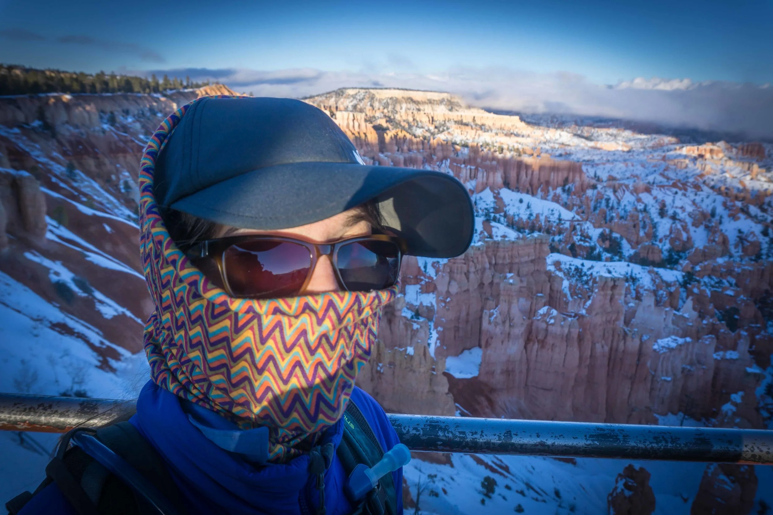 Jenni wearing two jackets, a wind mask, hat, long johns, and every other piece of clothing she could fit on at once.