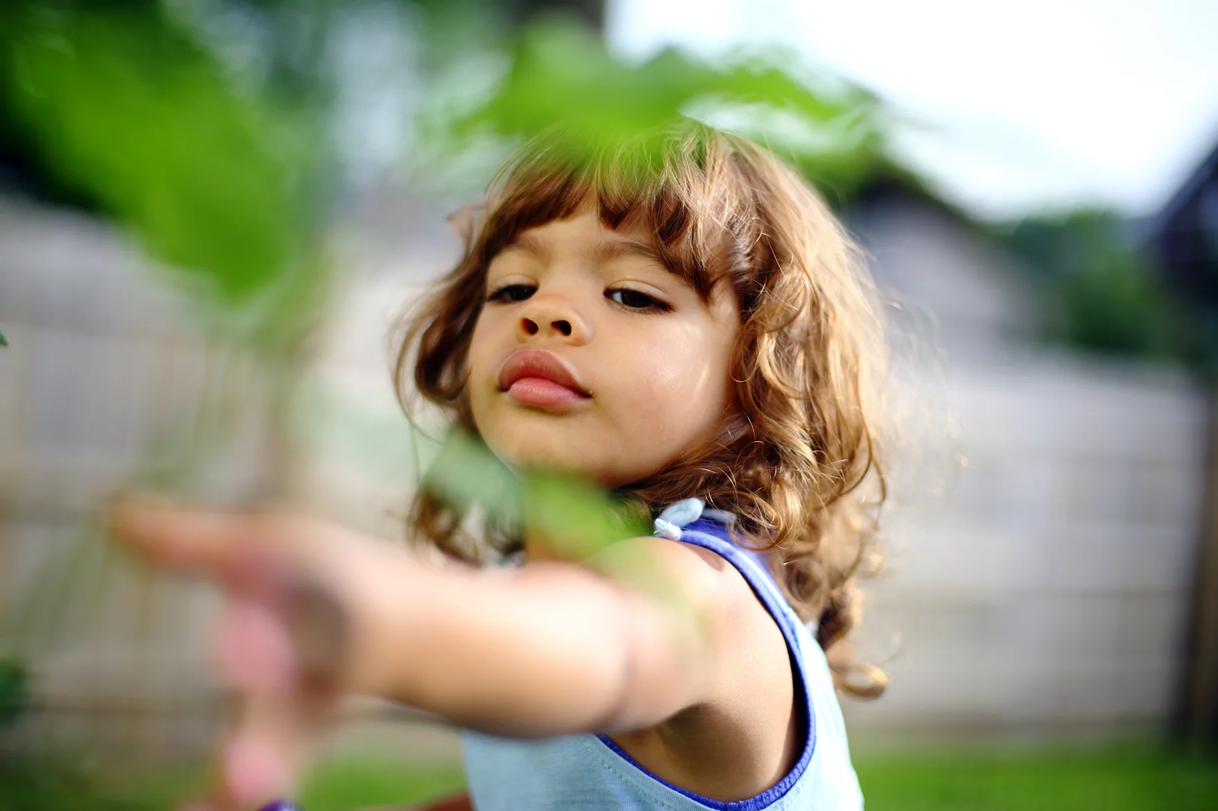 deep concentration picking flowers she isn't suppose to be picking