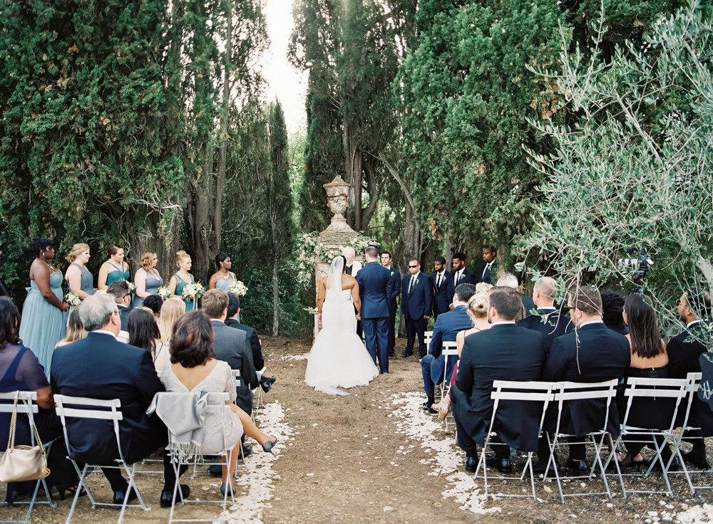 Whitney & Shaun's Intimate Tuscan Wedding | As seen on Style Me Pretty | Vicki Grafton Photography | Fine Art Film Tuscan Wedding Photographer | Intimate destination wedding photographer | Italy destination wedding photographer | Event Styling and Production: Chic Weddings In Italy | Floral Design: La Rosa Canina | Wedding Dress: Essense Of Australia | Wedding Invitations and Calligraphy: Written Word Calligraphy | Bride's Shoes: Valentino | Bridesmaids' Dresses: Jenny Yoo | Catering: Galateo Ricevimenti | Hair & Makeup: Giulia Cresci | DJ: Francis Jay | Groom's Attire: J. Hilburn | Groomsmen Attire: The Black Tux | String Quartet: Firenze Classica | Venue: BORGO STOMENNANO | Bridal Boutique: Betsy Robinson Bridals | Groom's Shoes: Salvatore Ferragamo | Hair Accessories: Jennifer Behr | Programs: Written Word Calligraphy | Save The Dates: Carol Woldhuis Designs | Cinematography: East West Productions 