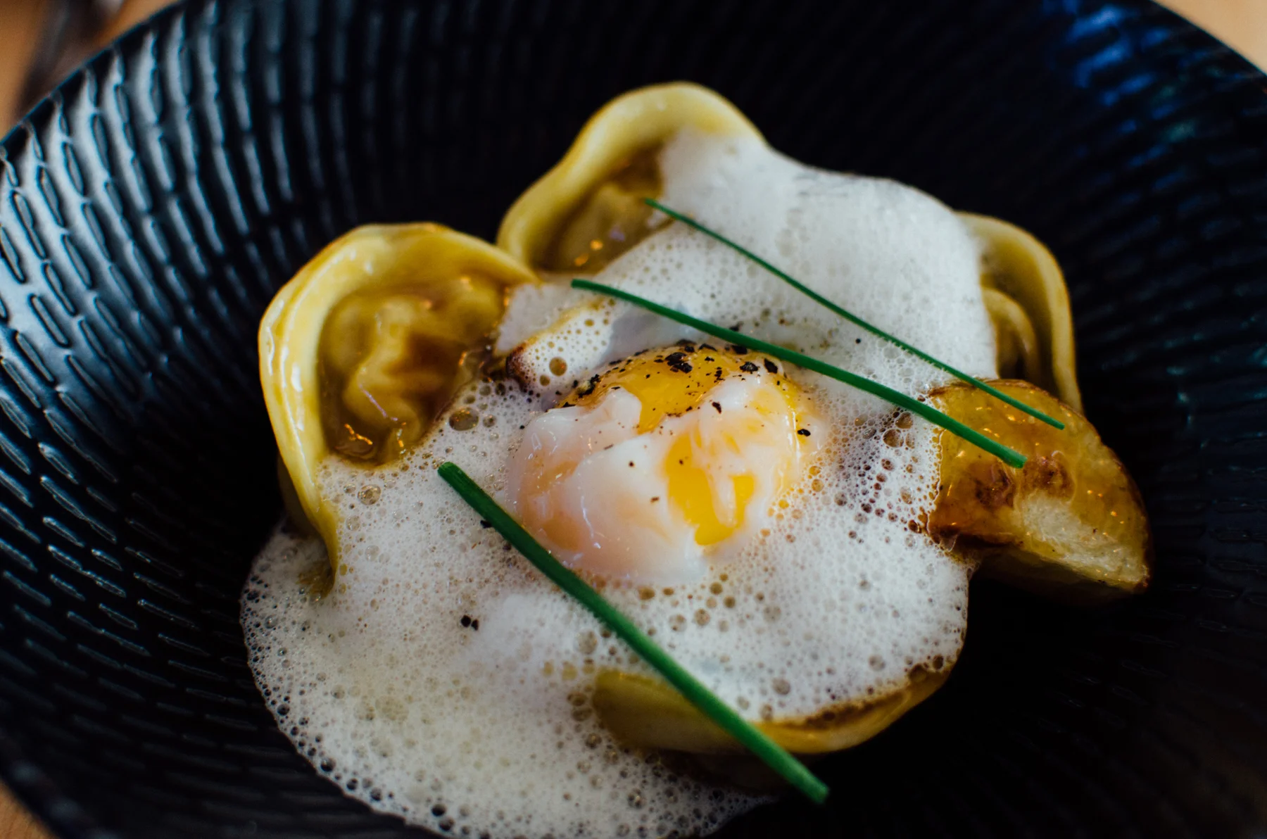 Duck Tortellini S$12.90++ poached egg, new potato & parmesan emulsion