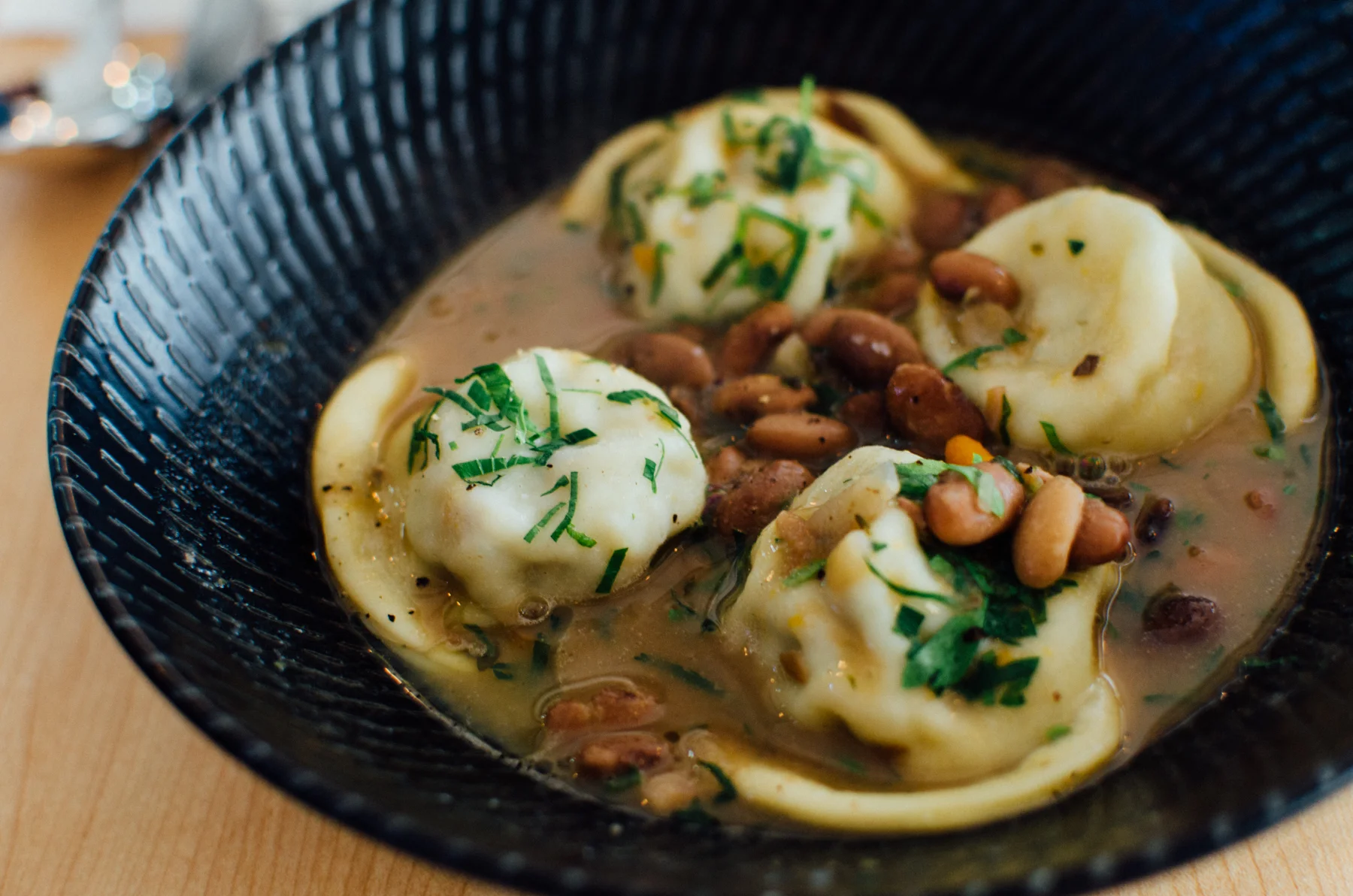 Pork Ravioli S$10.90++ borlotti bean ragu and pork broth