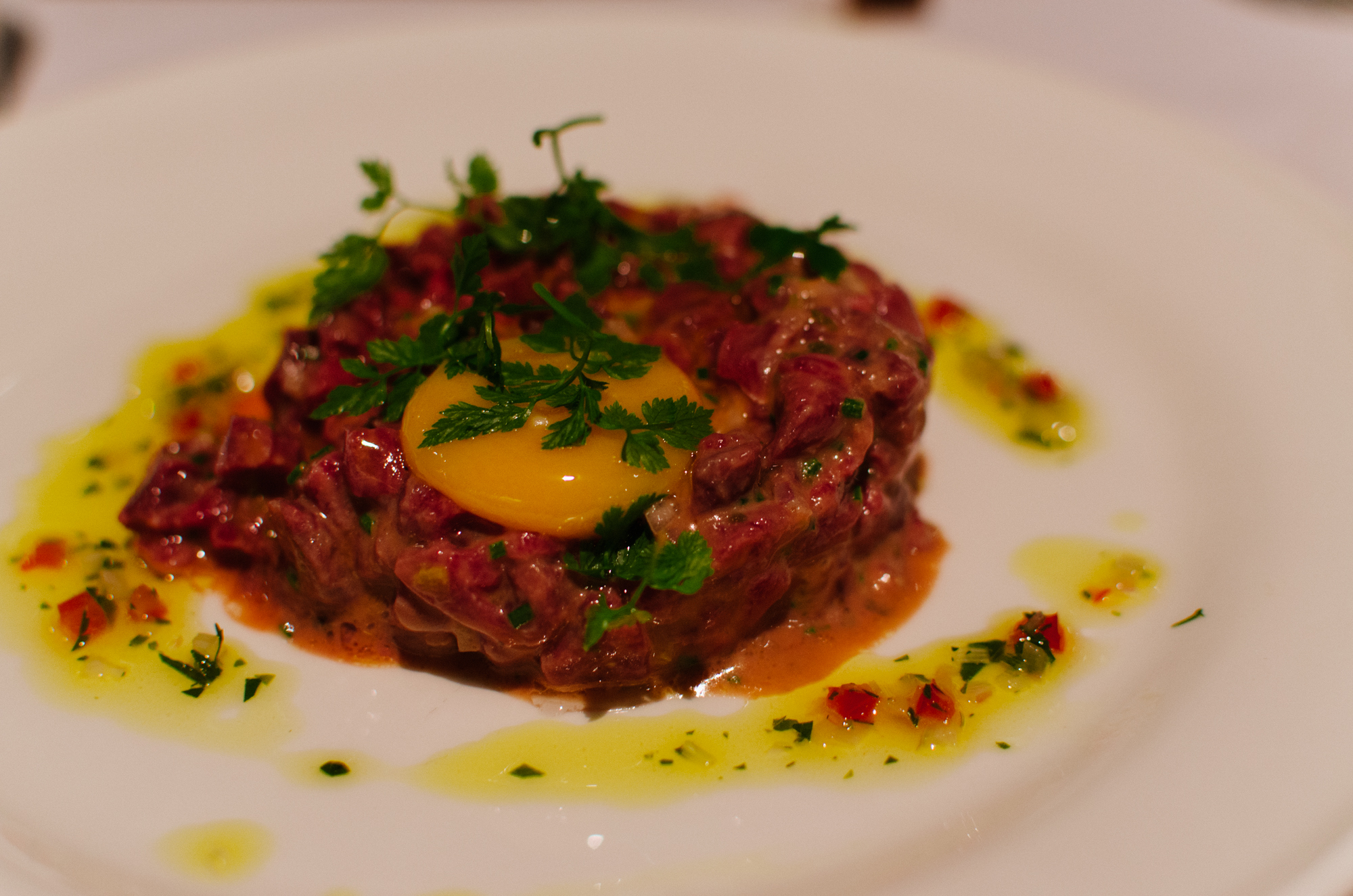 Robbins Island Wagyu Oyster Blade Tartare, Single Malt Dressing, Egg Yolk, Toasted Brioche 
