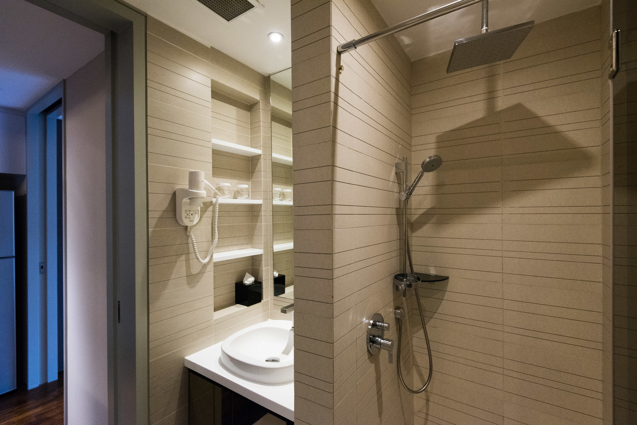 Rain Shower in the Bathroom of the One Bedroom Deluxe Suite