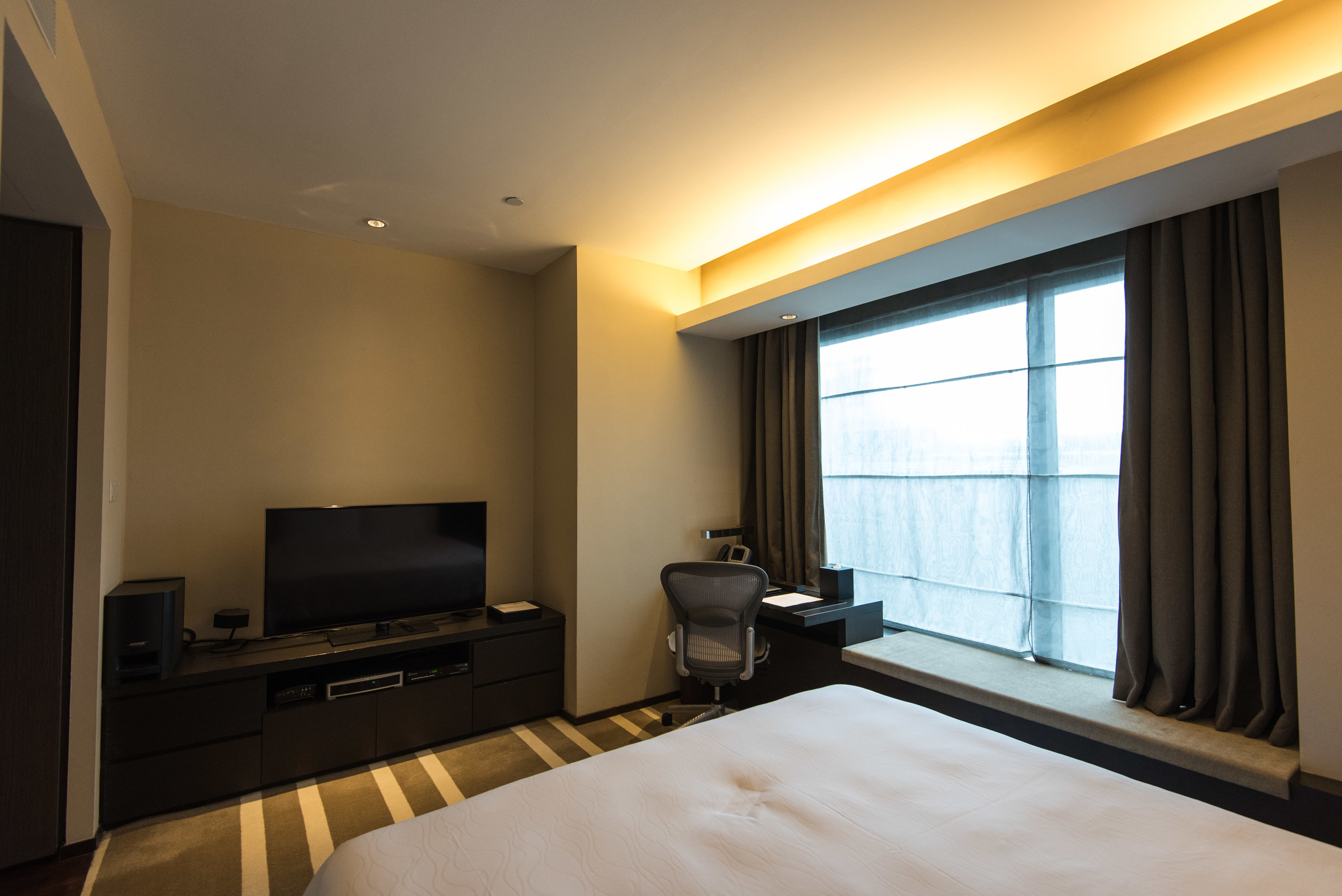 Bedroom of the One Bedroom Deluxe Suite