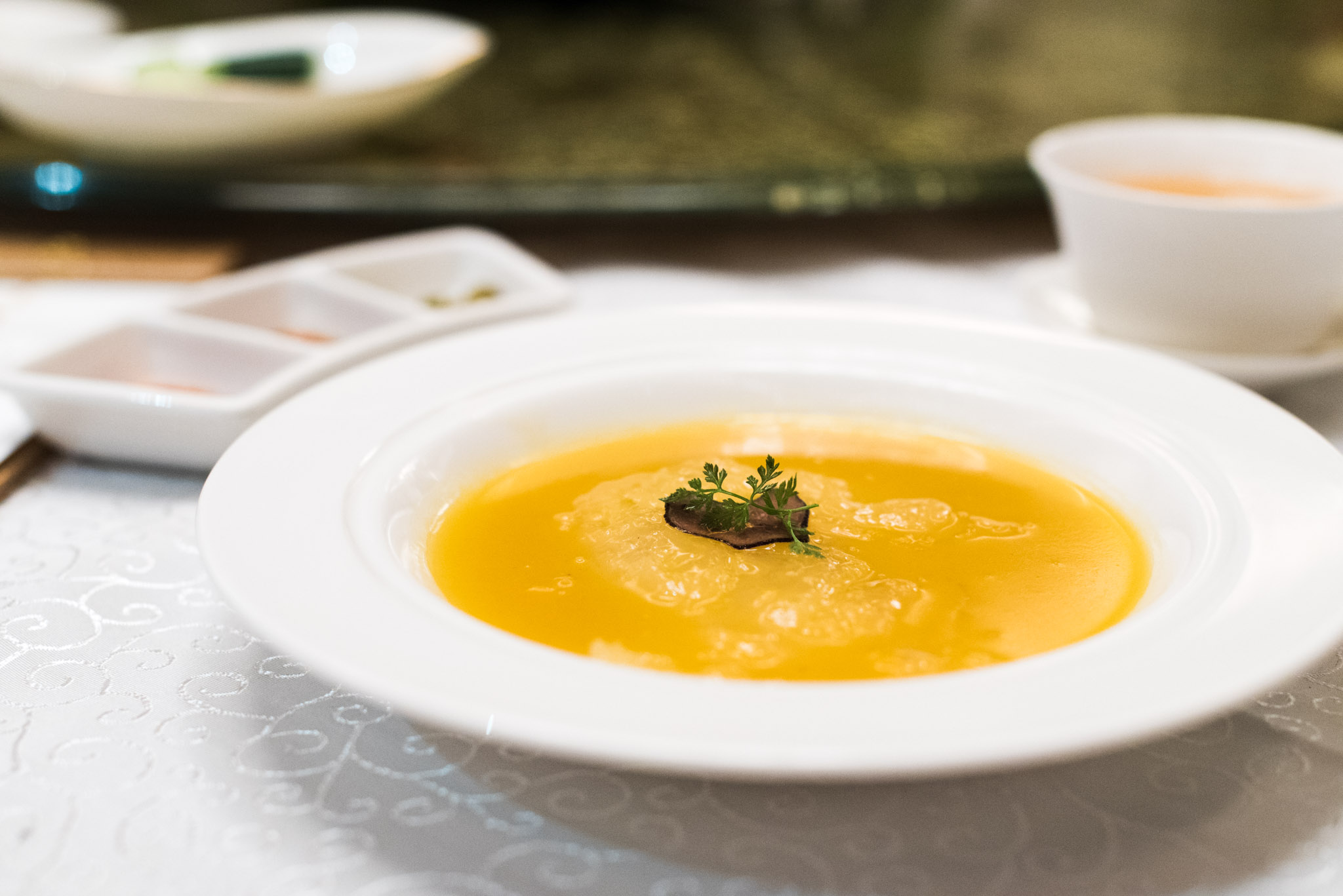 Braised Superior Bird's Nest with Black Truffle in Pumpkin Sauce (南瓜汁浓汤黑松露烩官燕盏)