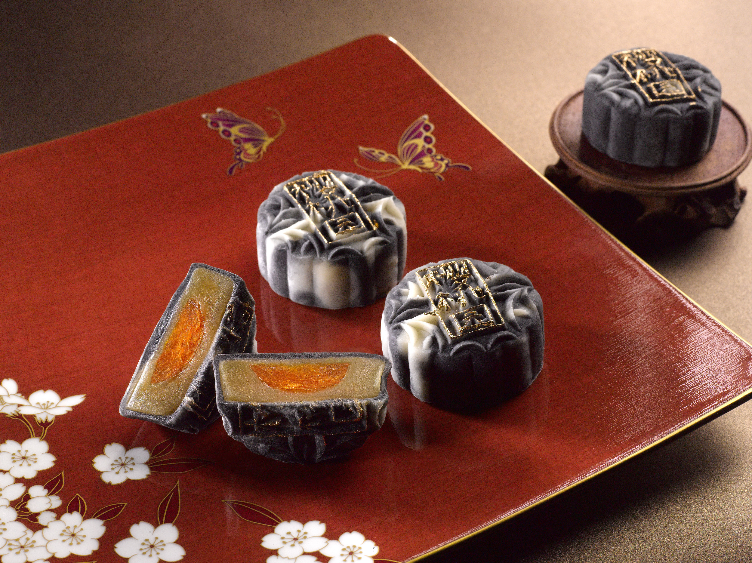 Charcoal Snow Skin Mooncake with Truffle Oil, Lotus Paste and Egg Yolk | Photo Credit: Mandarin Oriental, Singapore
