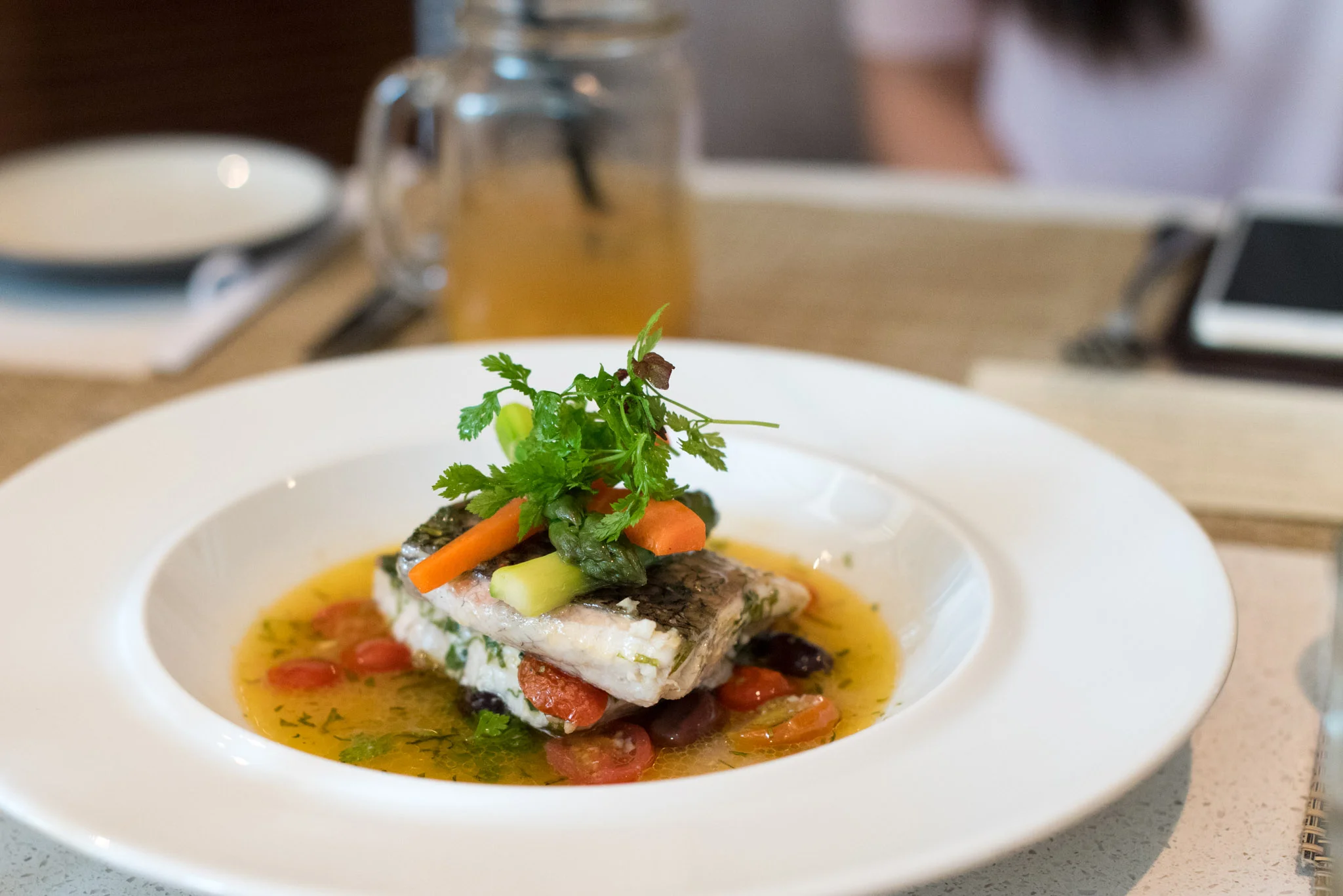 Neapolitan Style Sea Bass Cooked with Cherry Tomatoes, Capers, Wine and Basil The Waterfall - Shangri-La Singapore