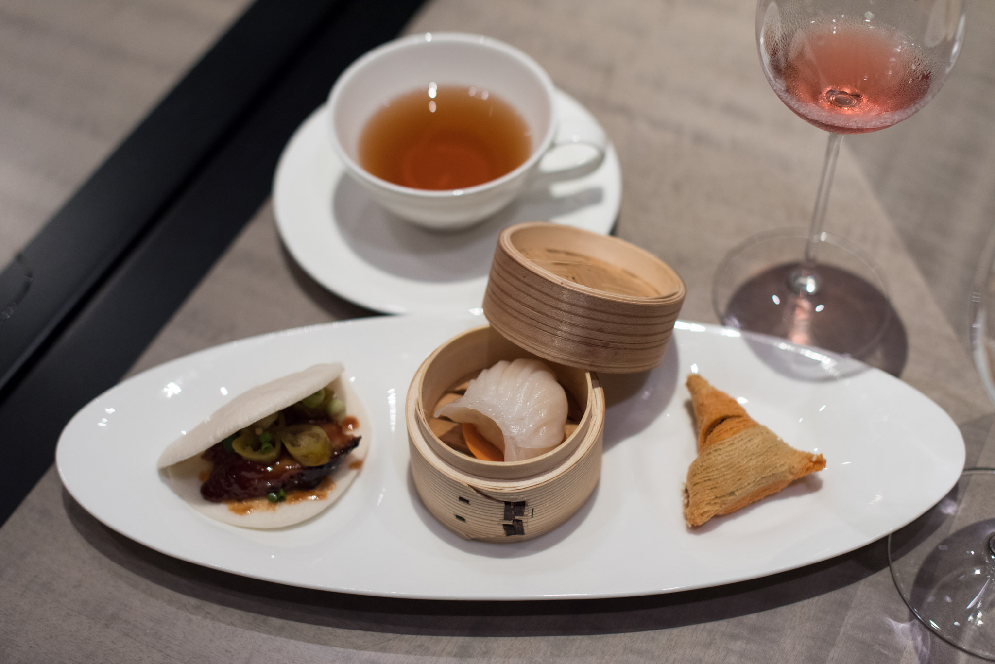 From Left: Char Siew Sliders with Homemade Pickled Green Chili (S$15++ per Serving), Steamed Shrimp Dumpling with Mushroom (S$2++ per Piece) and Crispy Flaky Pastry with Black Pepper Beef (S$3++ per Piece)Jiang-Nan Chun - Four Seasons Hotel Singapore