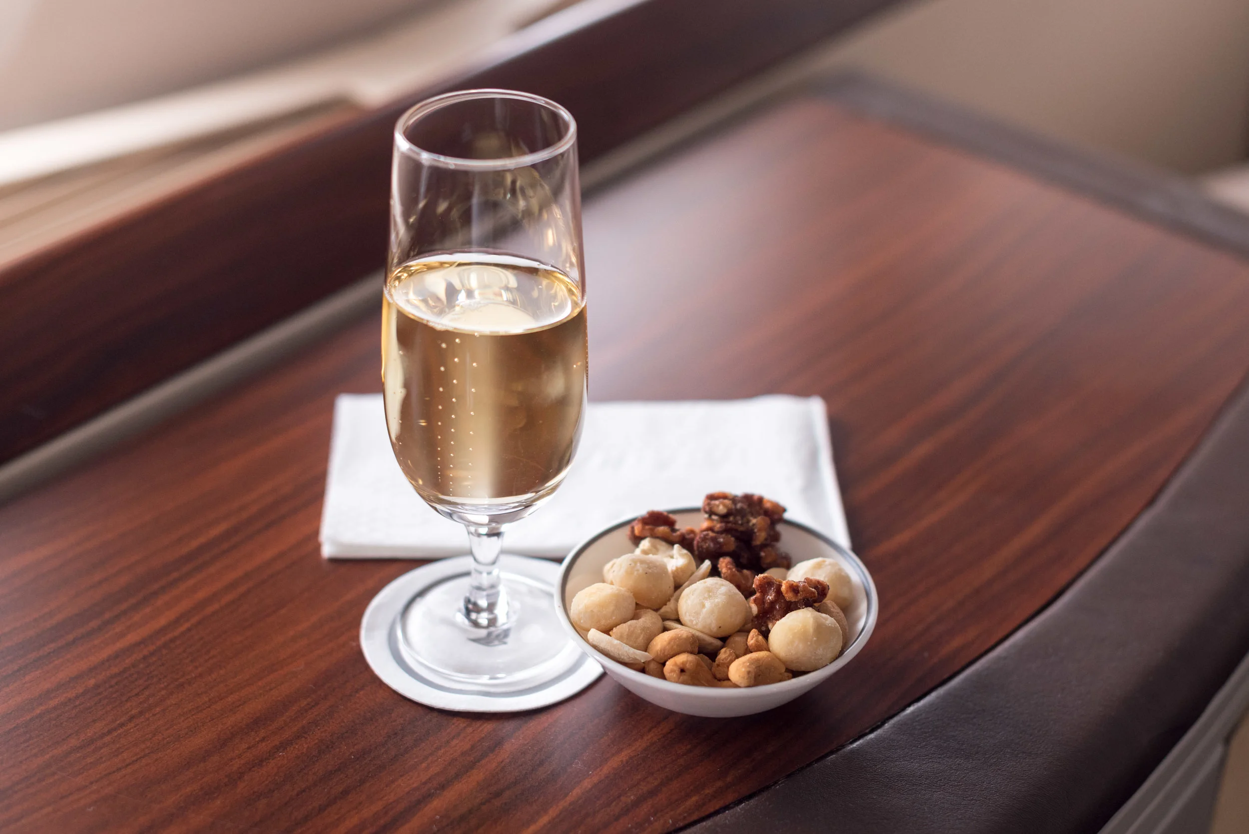 Krug 2004 and Nuts Singapore Airlines Suites SQ802 A380-800 - SIN to PEK