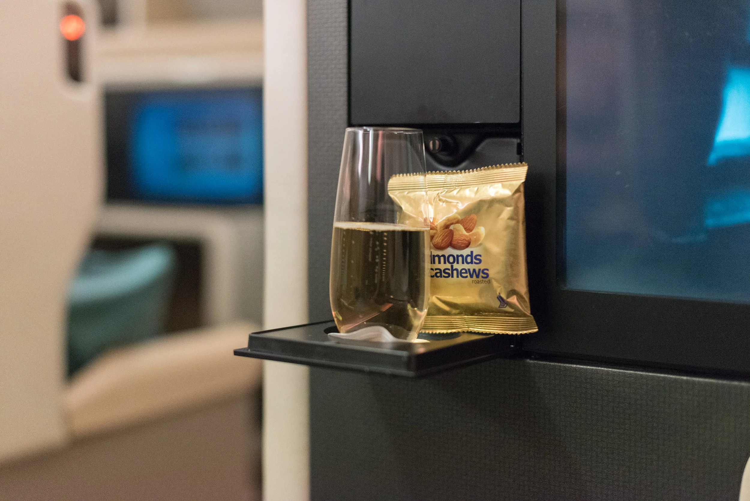 Champagne and Nuts Singapore Airlines Business Class SQ285 A380-800 - SIN to AKL