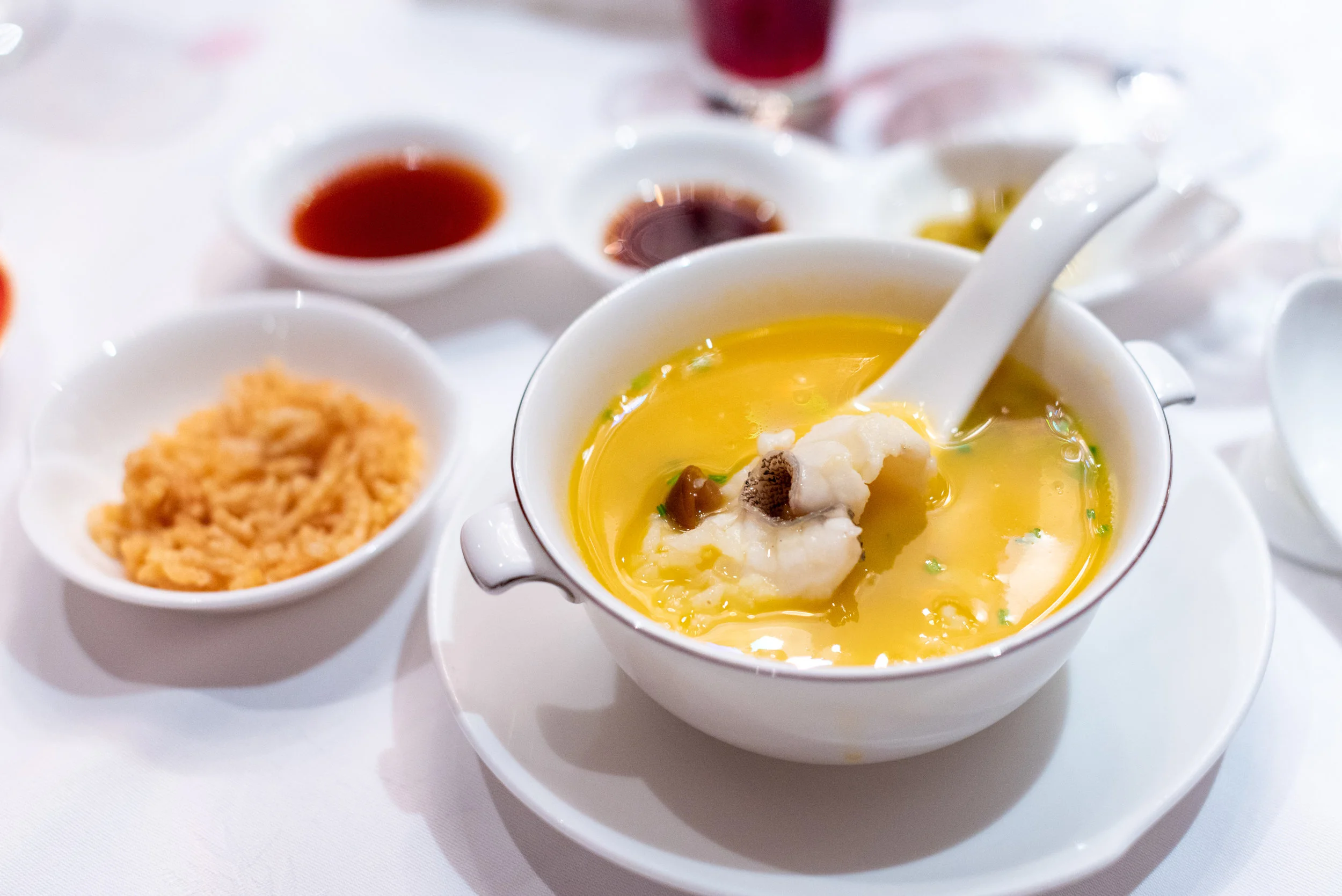 Poached Rice with Star Garoupa Fillet and Crab Meat in Pumpkin and Fish Broth (金汤海皇泡饭) The Chef's Table at Shang Palace - Shangri-La Hotel, Singapore