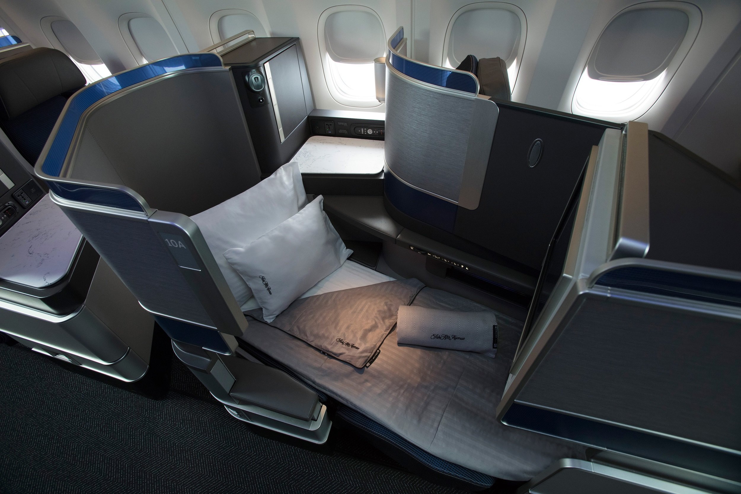 Бизнес класс б. Polaris Business class United. United Polaris Seat. United Airlines 737 Seats. Polaris United Airlines.