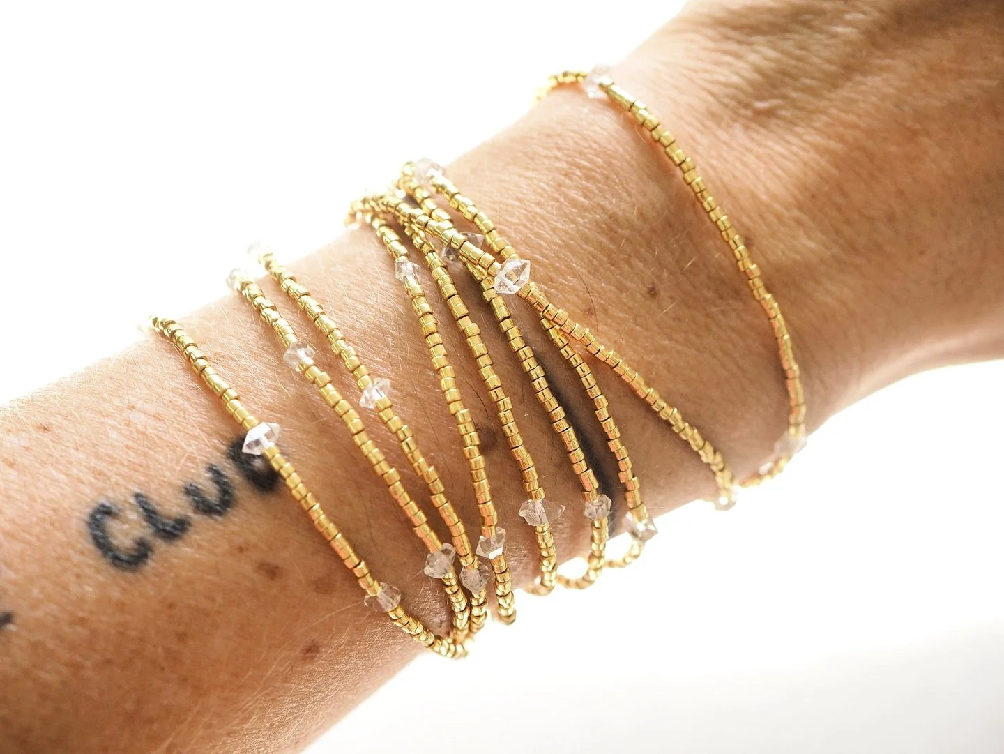NEW!  The Glo #Herkimerdiamond #wrapbracelet with #gold plated #seedbeads.  Designed for @glogomezp and now available online. ✨ 

#jewelry #jewellery #mexico #puertovallarta #goldbracelet #bracelets #beaded #beadedbracelets