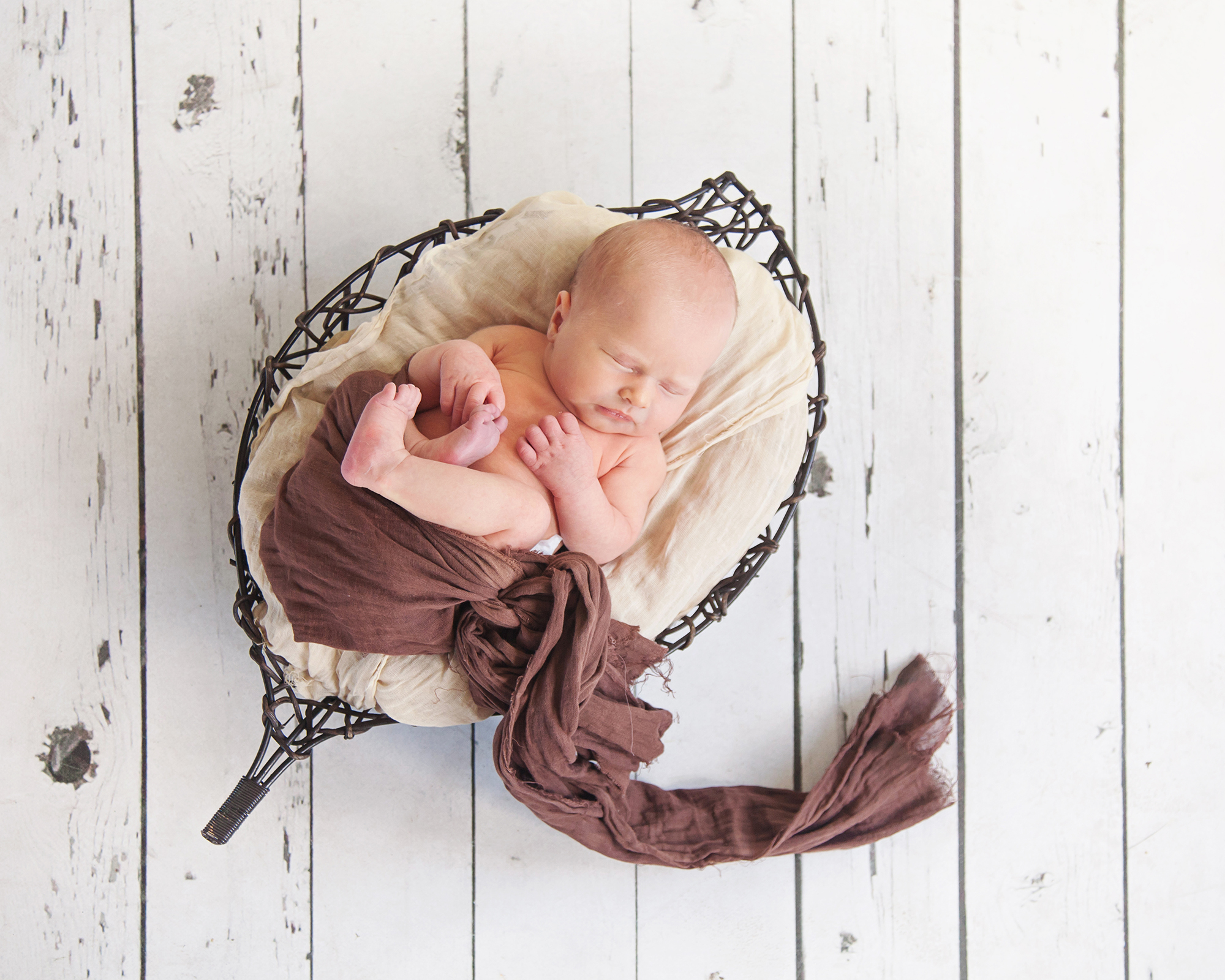 sleeping-newborn-basket