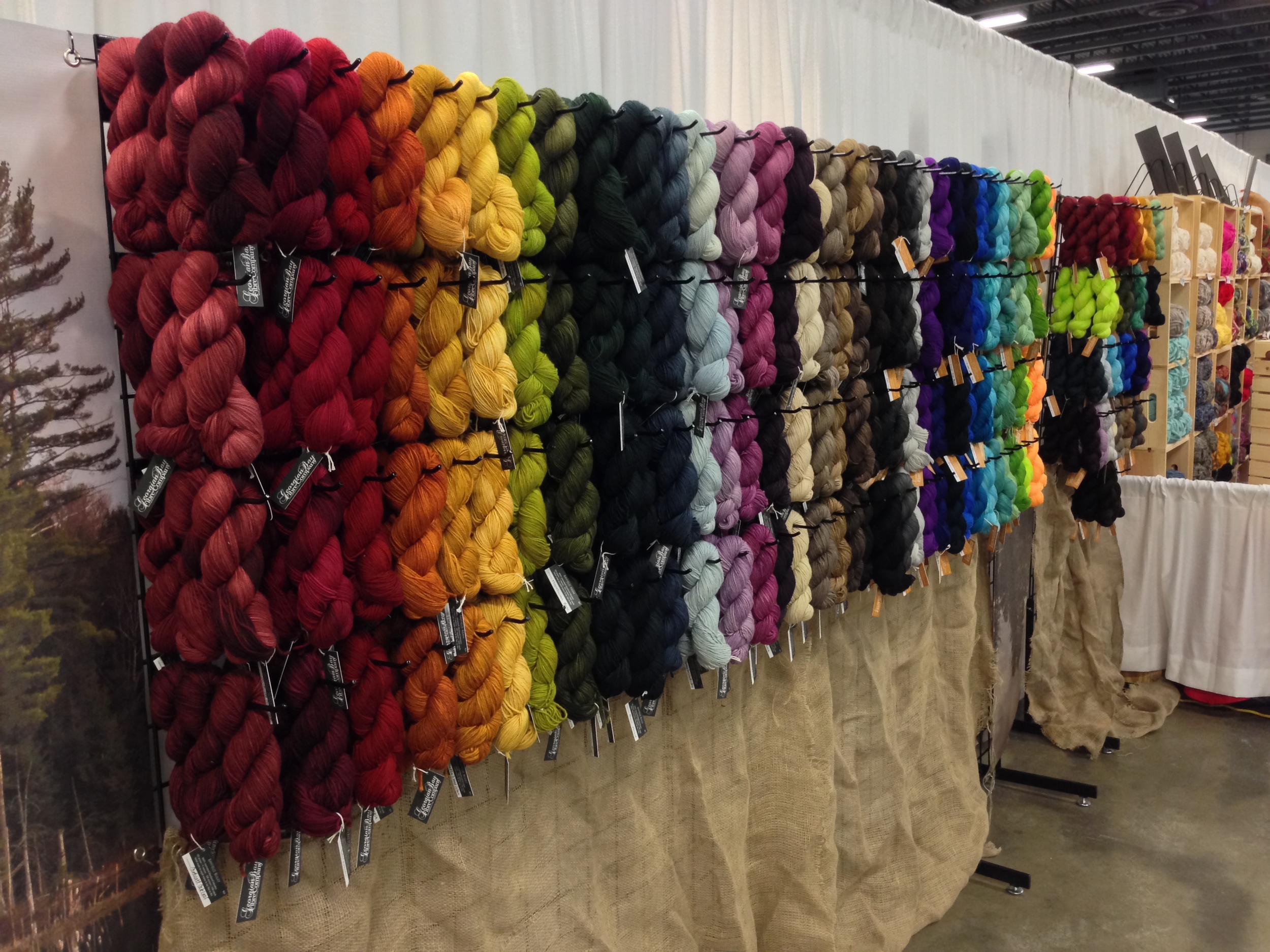 You can see in our KW display, we displayed two separate rainbows. Natural tones dyed on BFL on the left, and bright clear tones on superwash merino on the right. They just wouldn't play together nicely.
