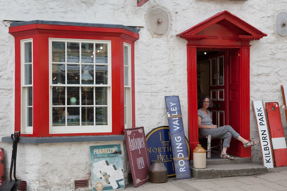 Ann outside the shop August 2013
