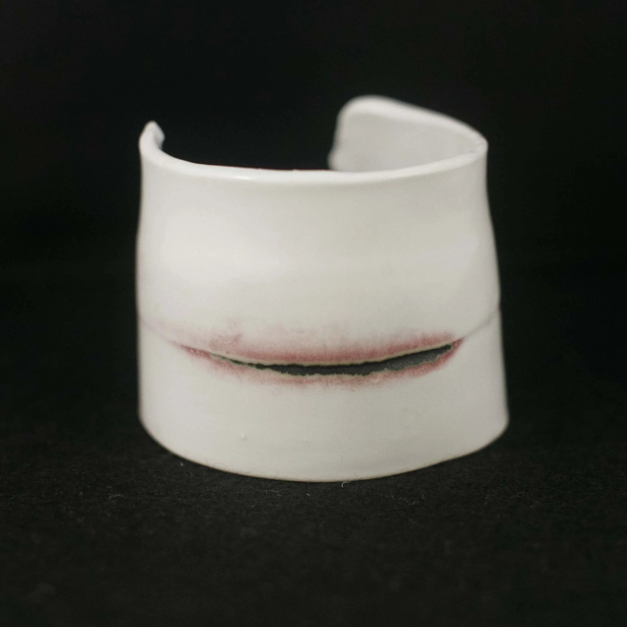 porcelain bangle bracelet with copper carbonate and celadon glaze