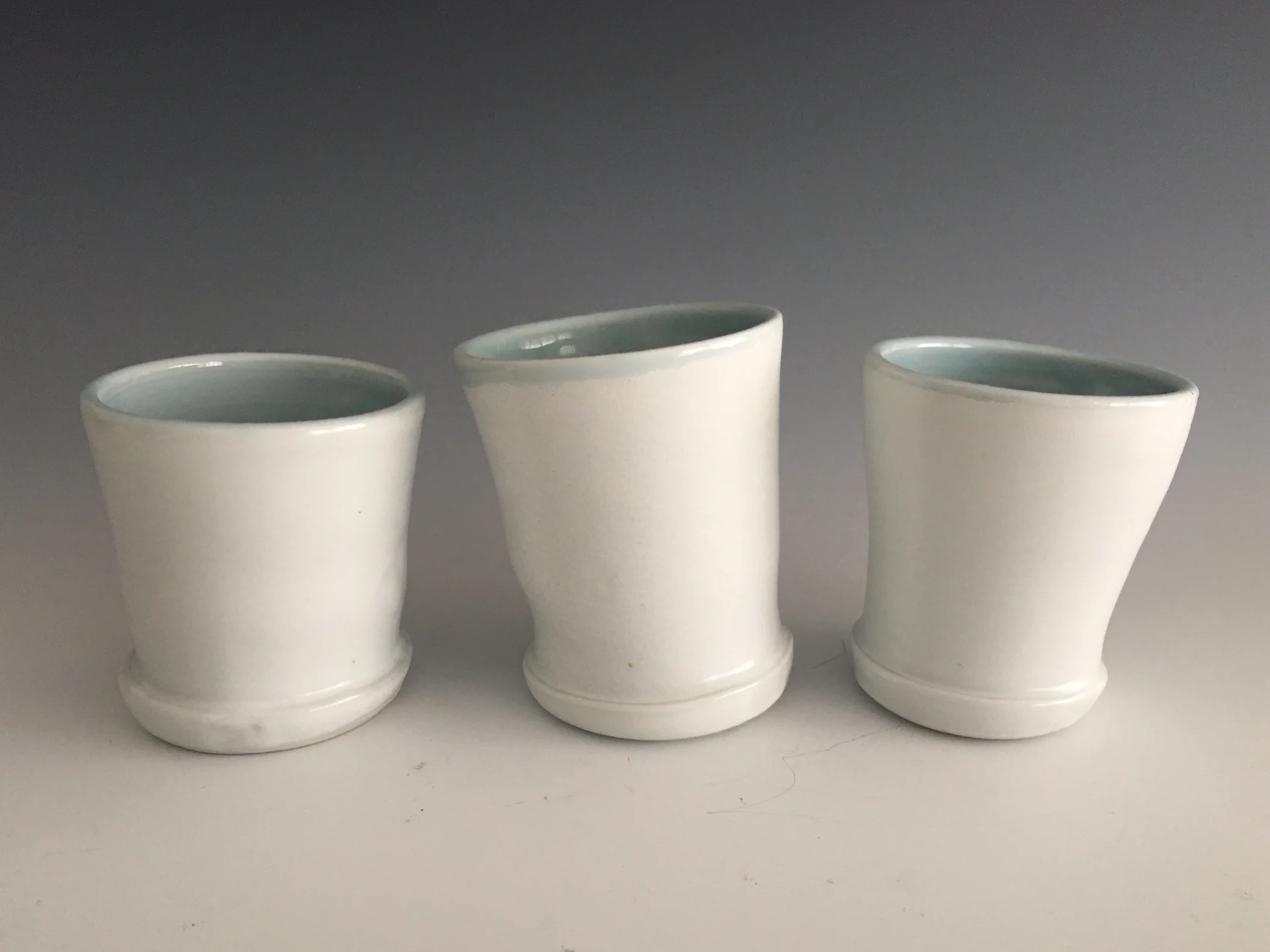 small porcelain tumblers