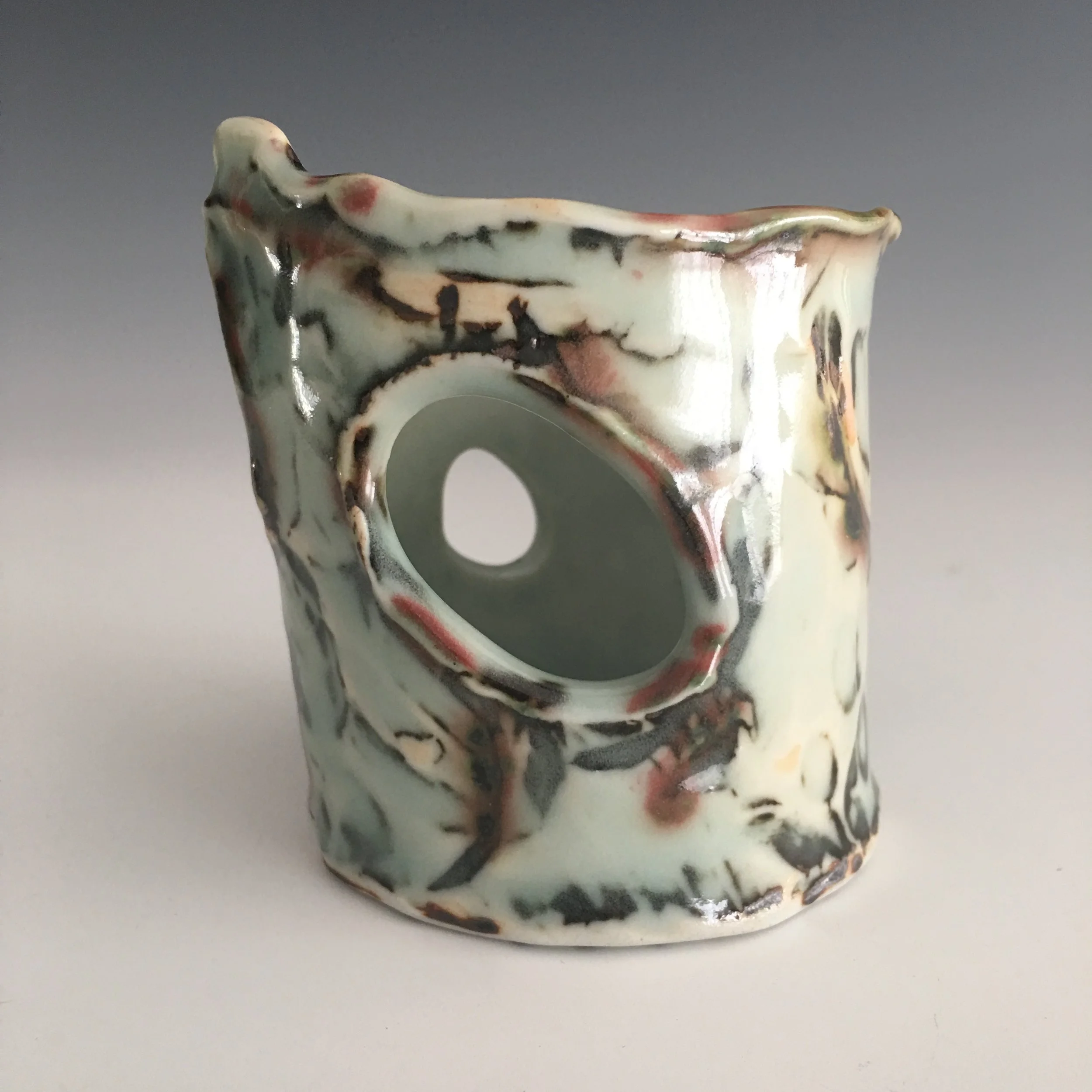 statement bangle bracelet with iron oxides and celadon glaze