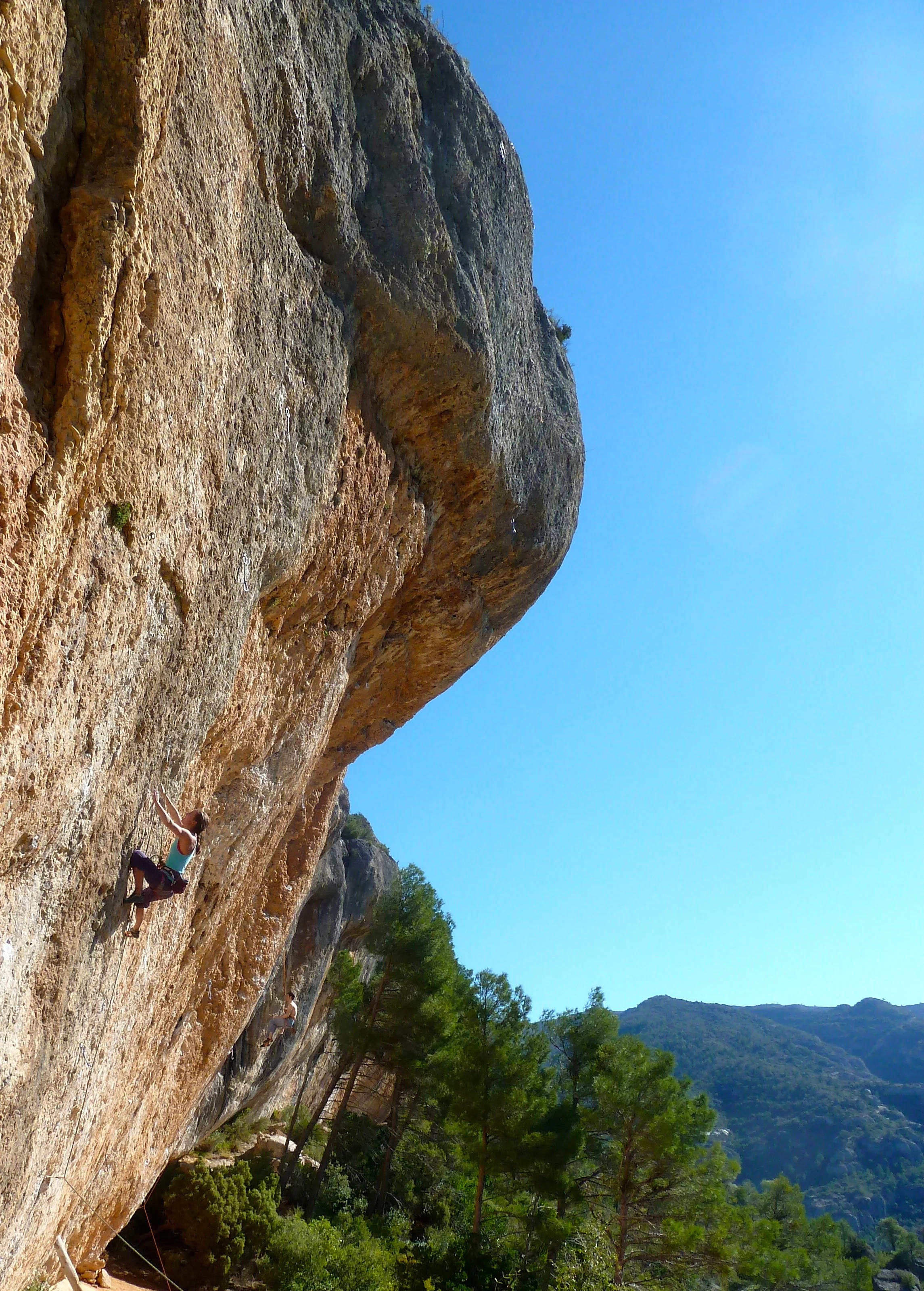 Heather on one of the first classic 7a+'s of Sector Espadelles in Margalef. High on the hill, lots of sun and on this route, lots of thin pockets. Tough for the grade! Camera: iPhone 4S