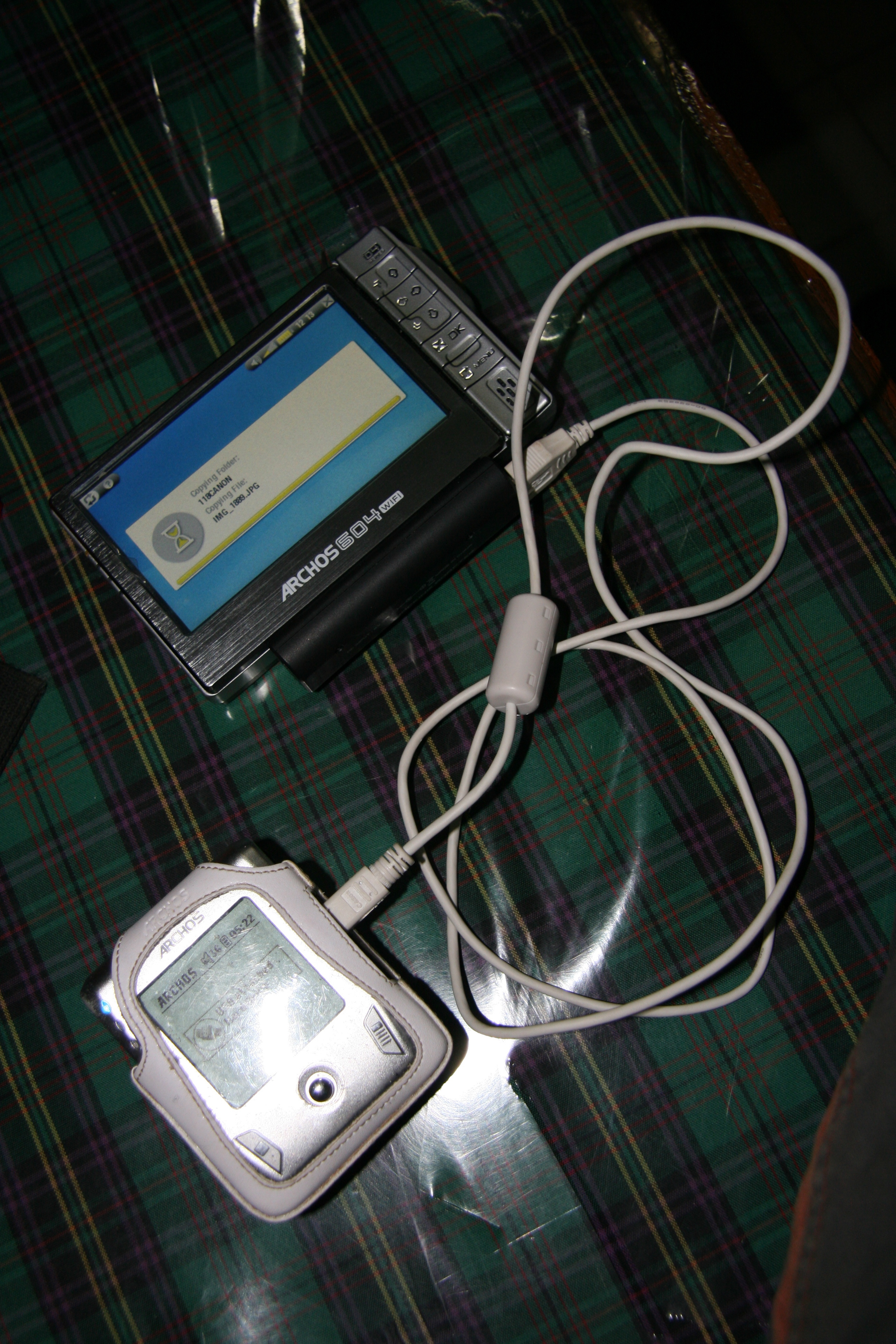 Circa December 2006, January 2007 and most importantly, pre-iPhone (I knew where the trends were going). My travel companion for watching videos, using the Internet and (something that still can't be done easily - backing up files from my camera on to the main hard drive of the Archos 604 Wifi , and then copying another version of it onto a secondary portable drive.